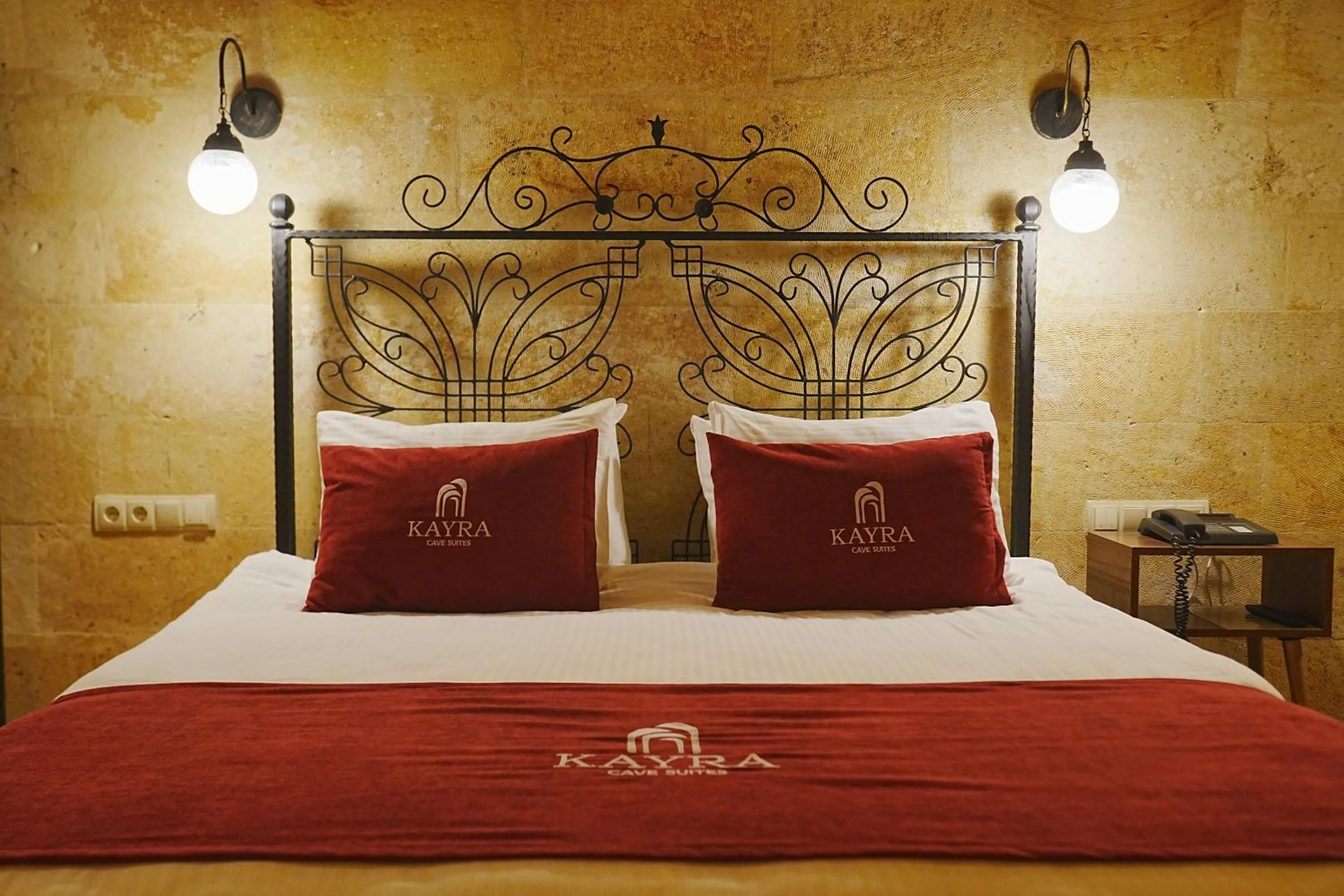 Bed in Kayra Cave Suites