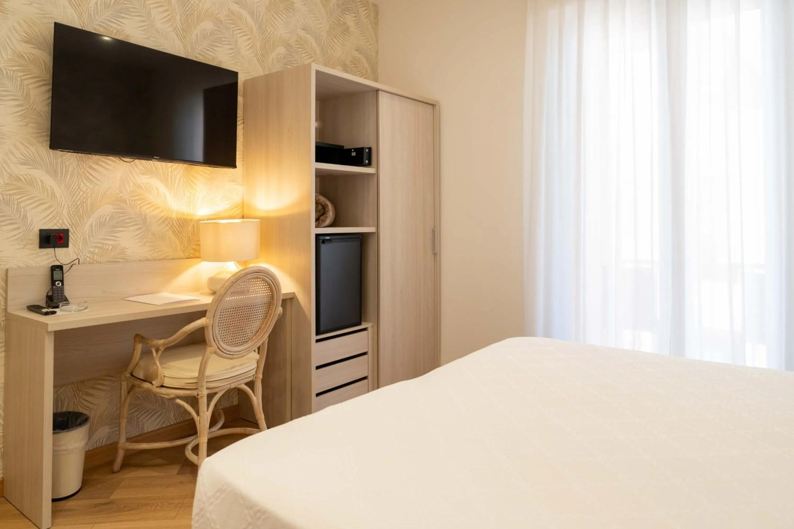 Bed in Hotel Florida Lerici