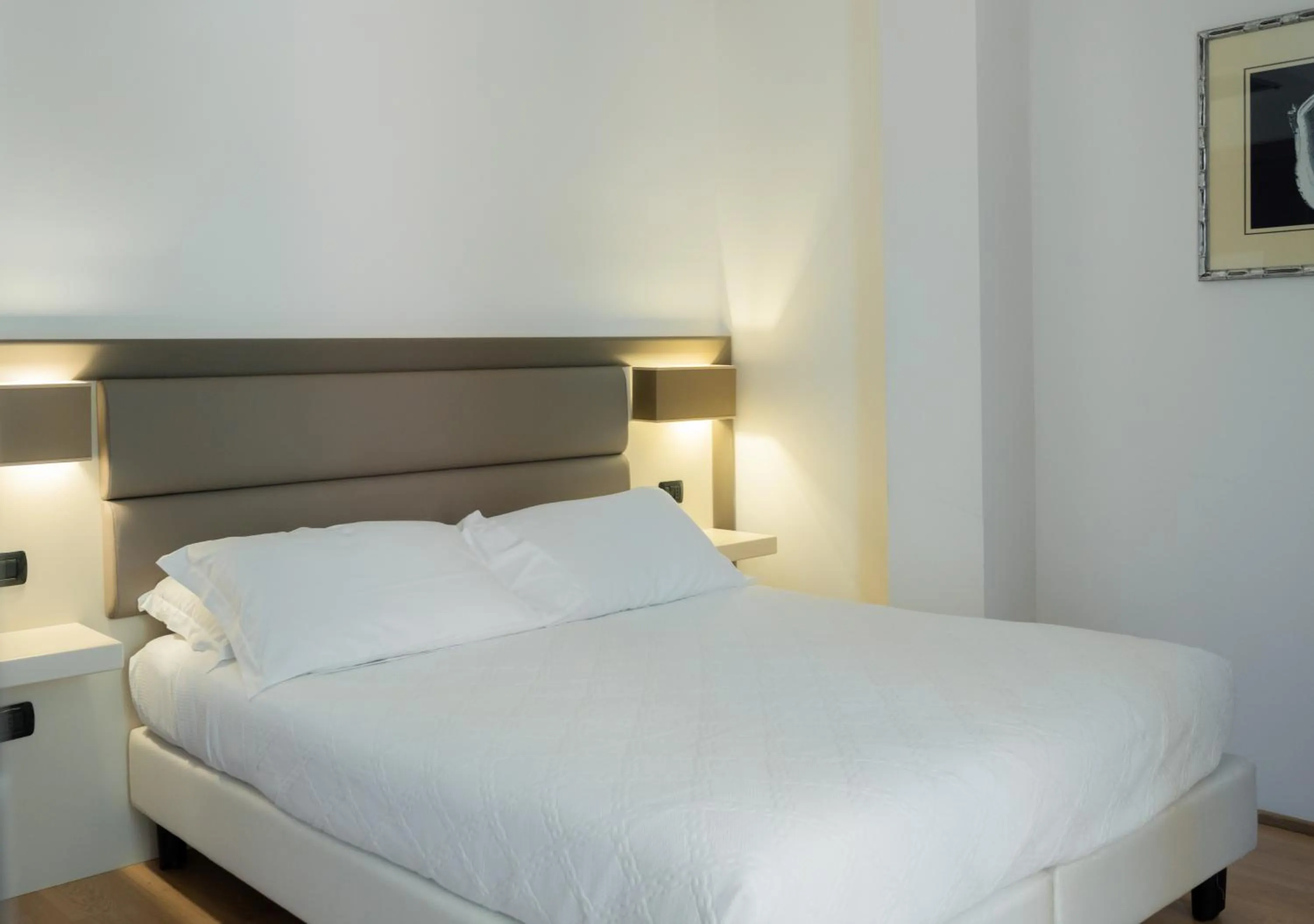 Bed in Hotel Florida Lerici