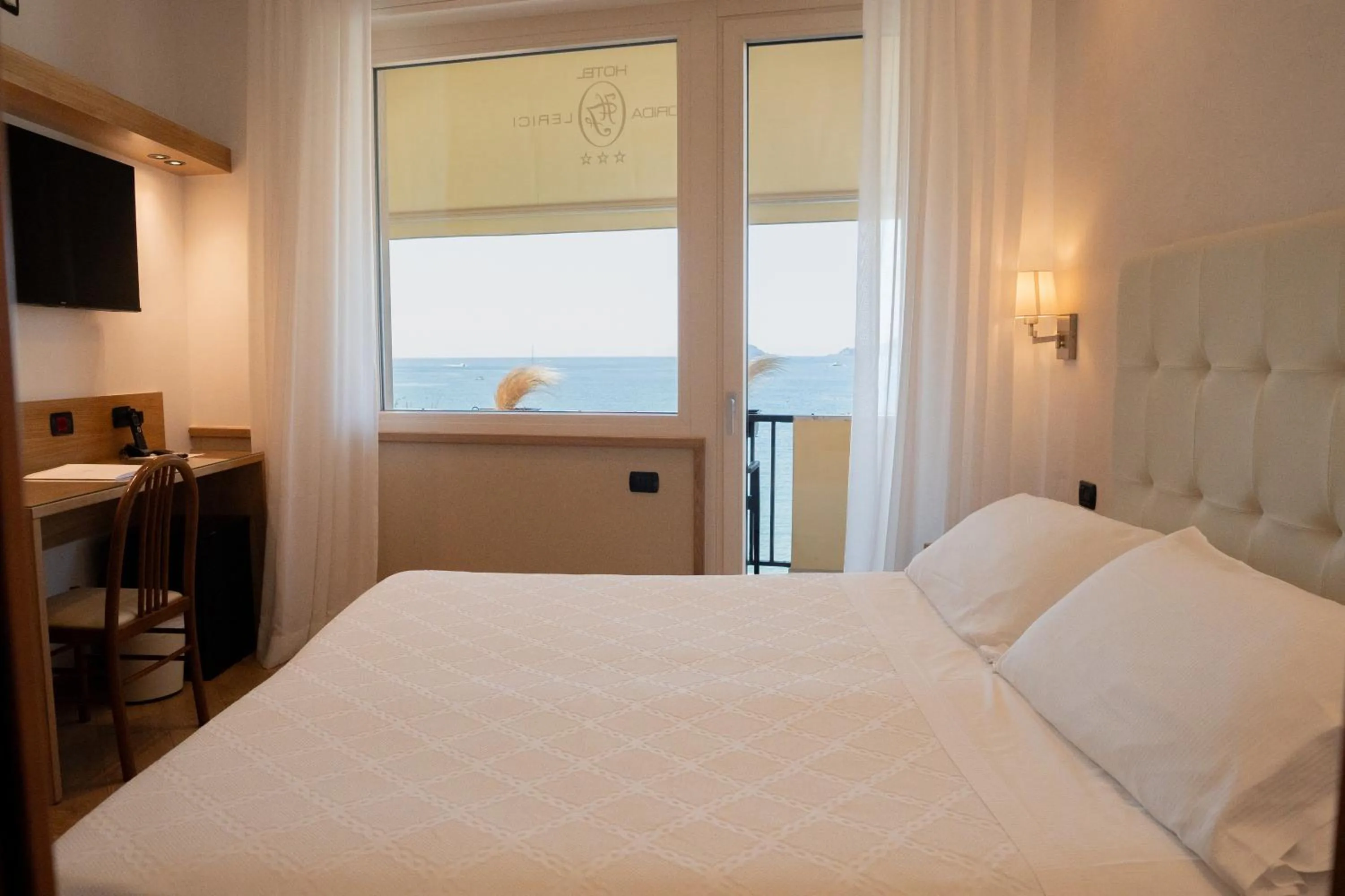 Bed in Hotel Florida Lerici