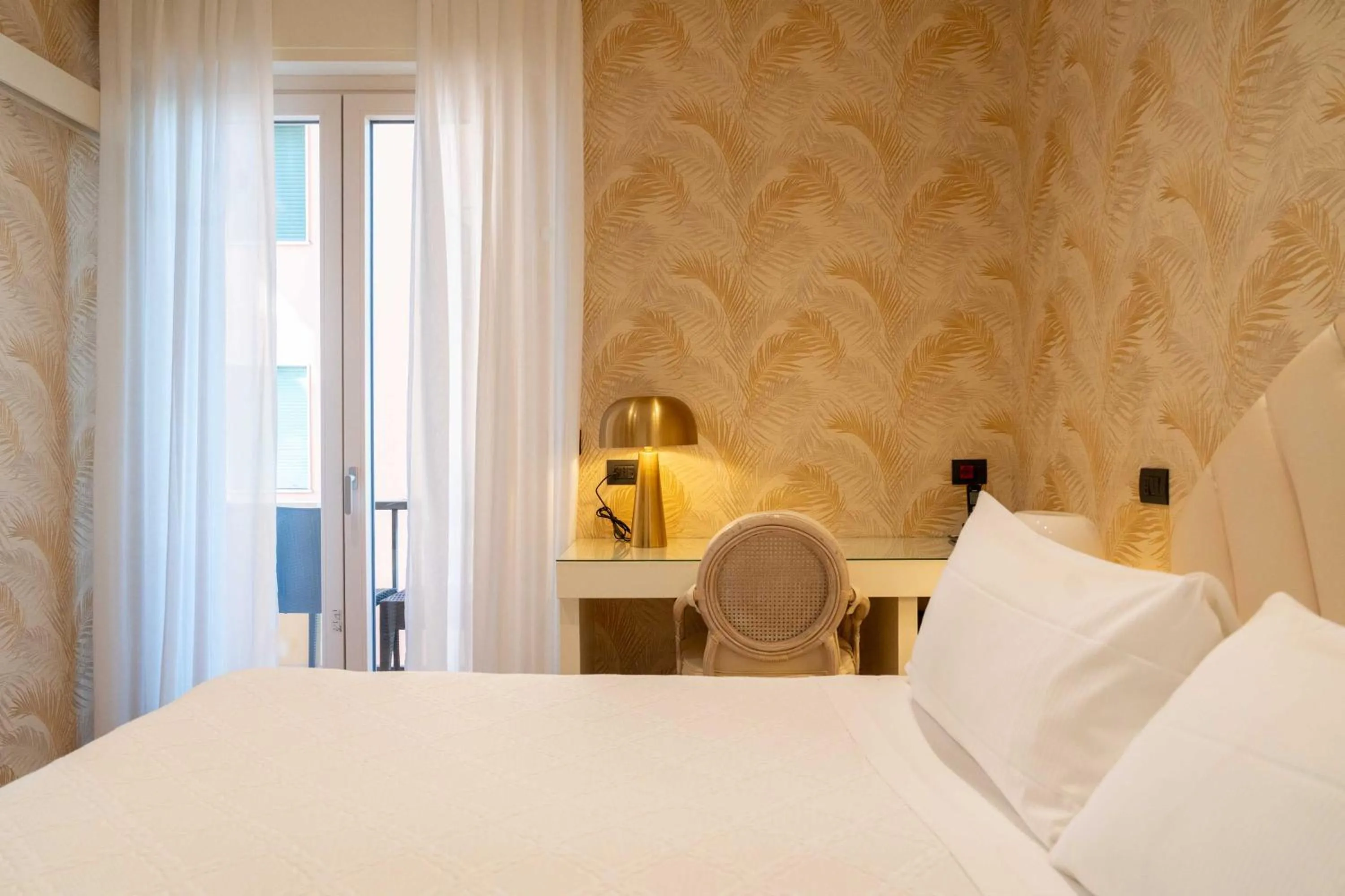 Bed in Hotel Florida Lerici