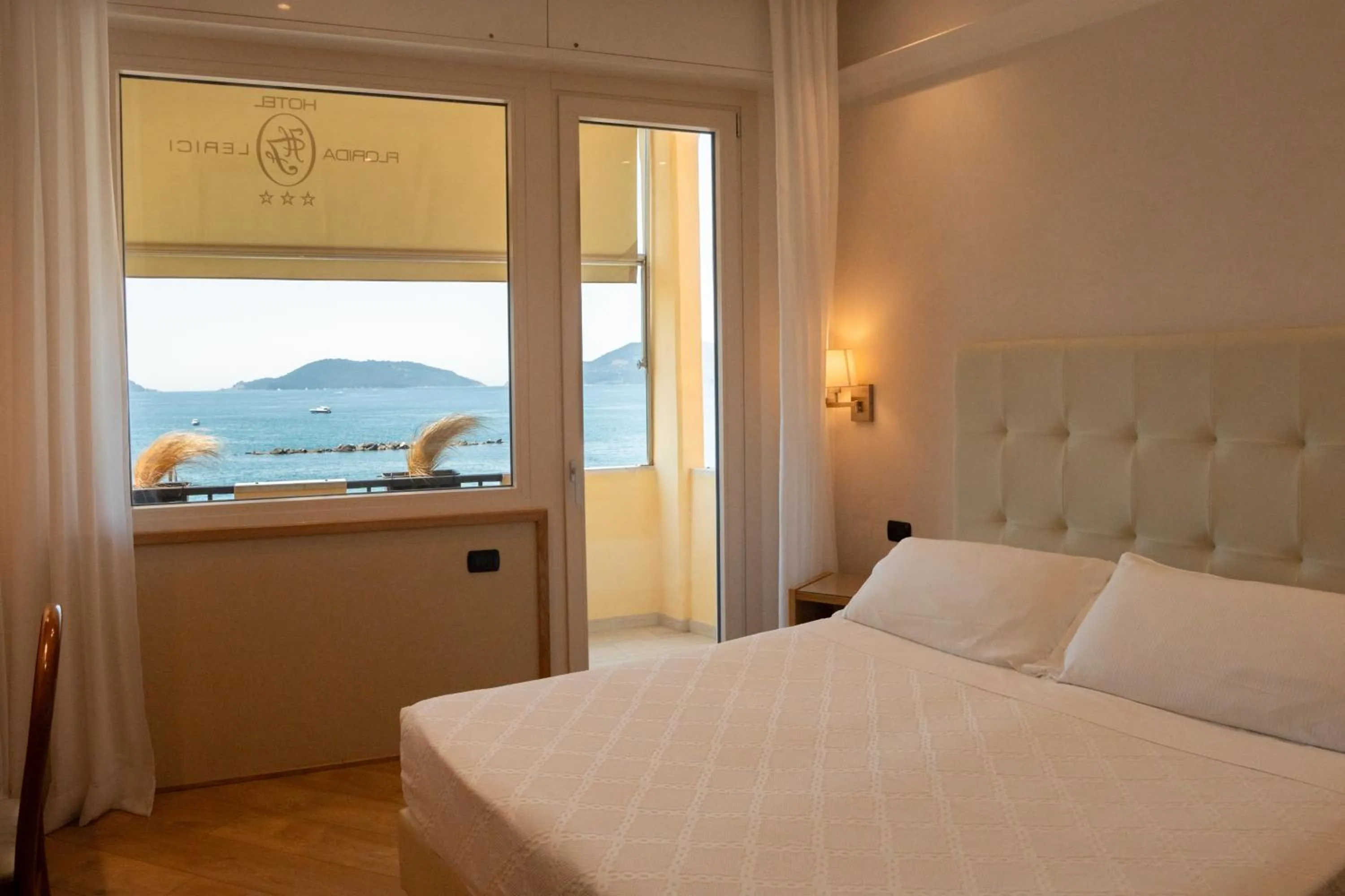 Bed in Hotel Florida Lerici