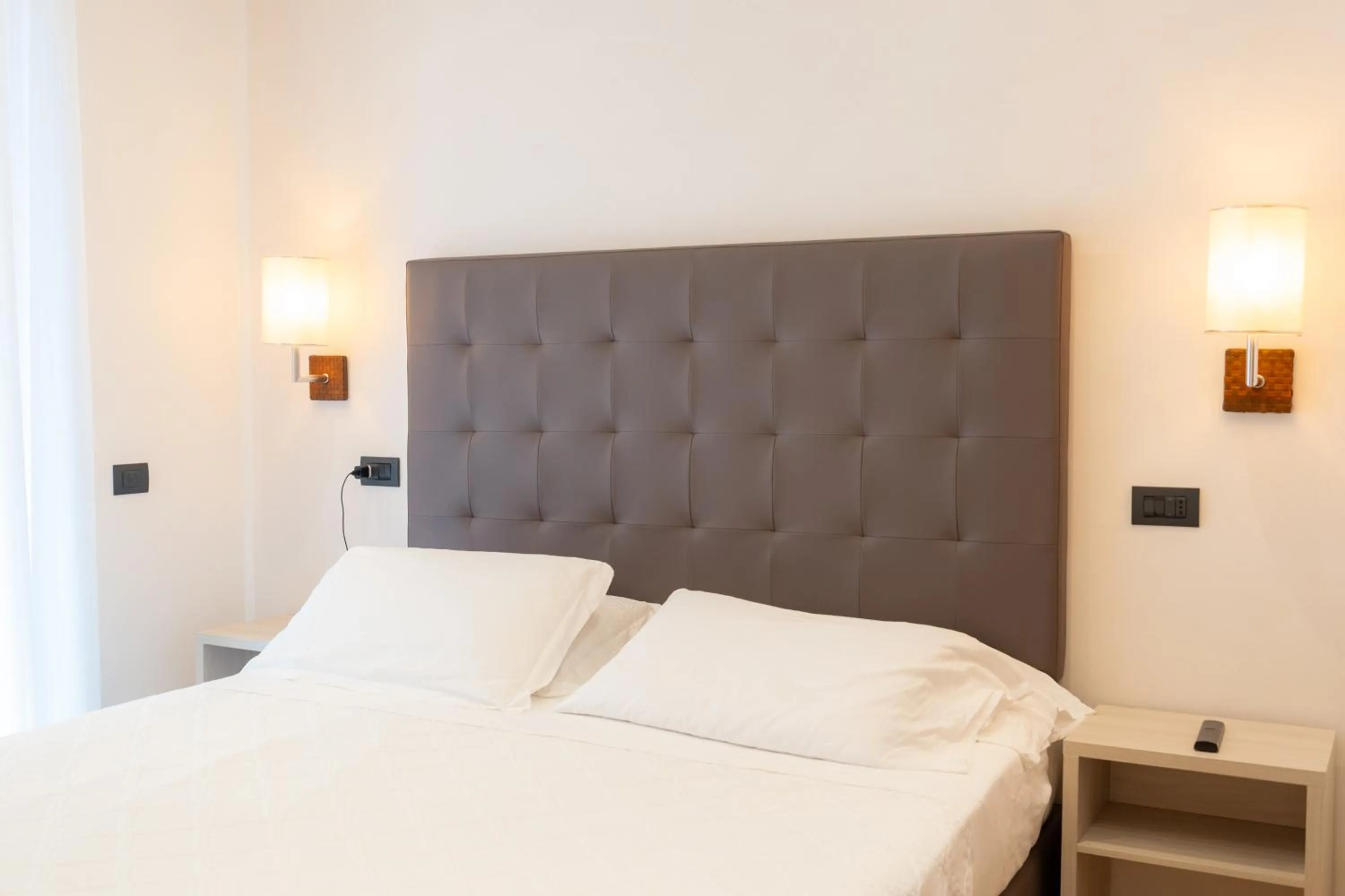 Bed in Hotel Florida Lerici
