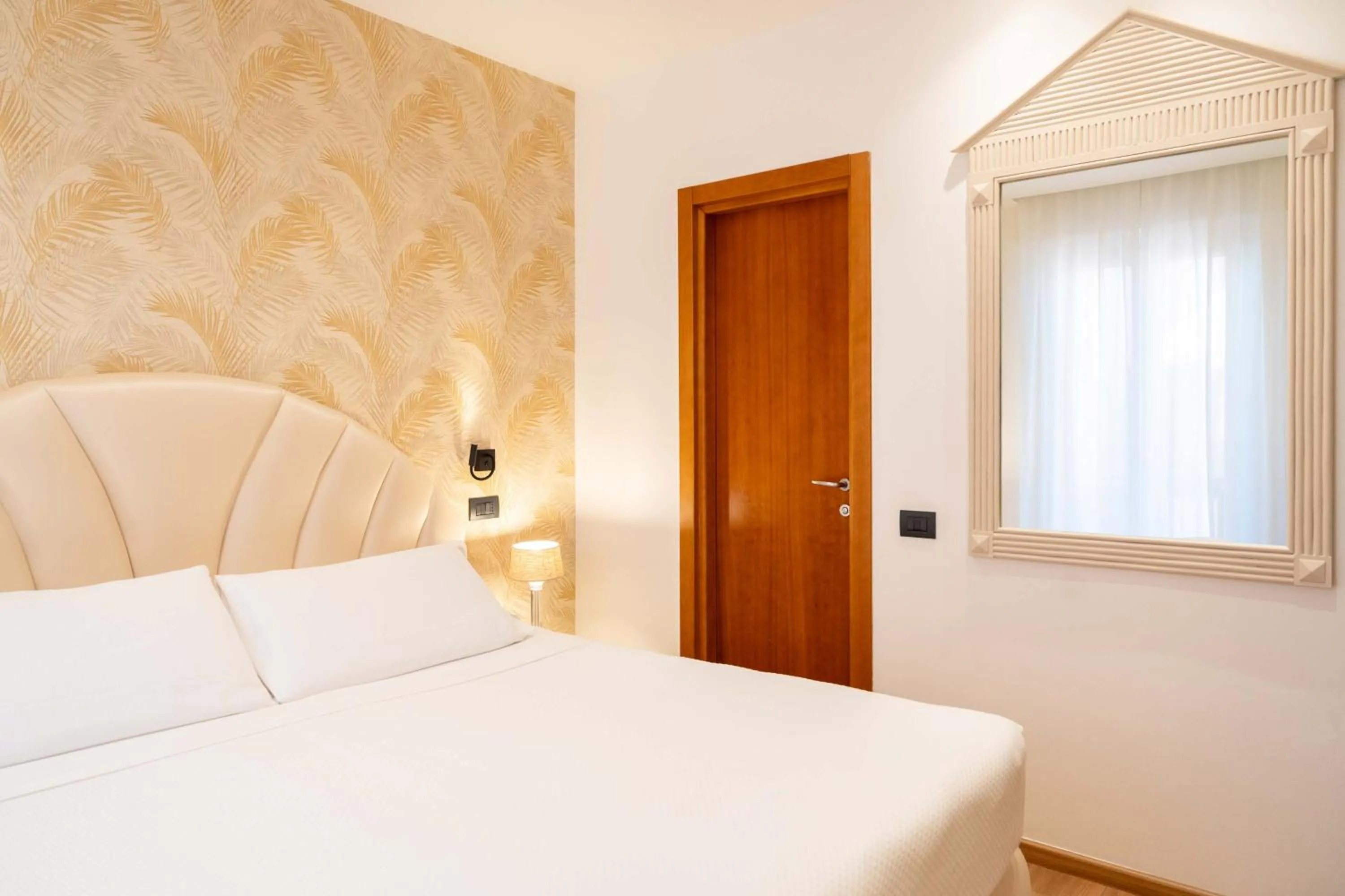 Bed in Hotel Florida Lerici