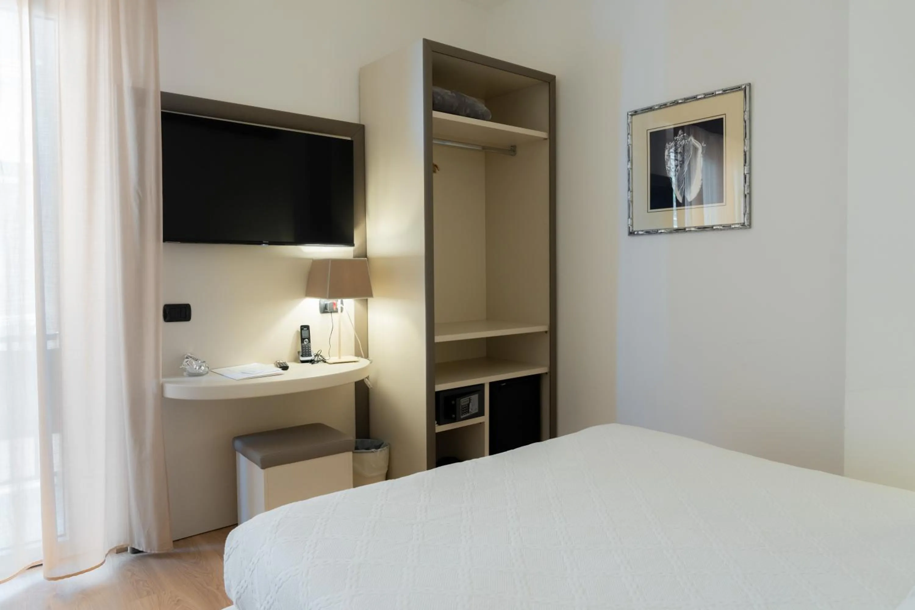 Bed in Hotel Florida Lerici