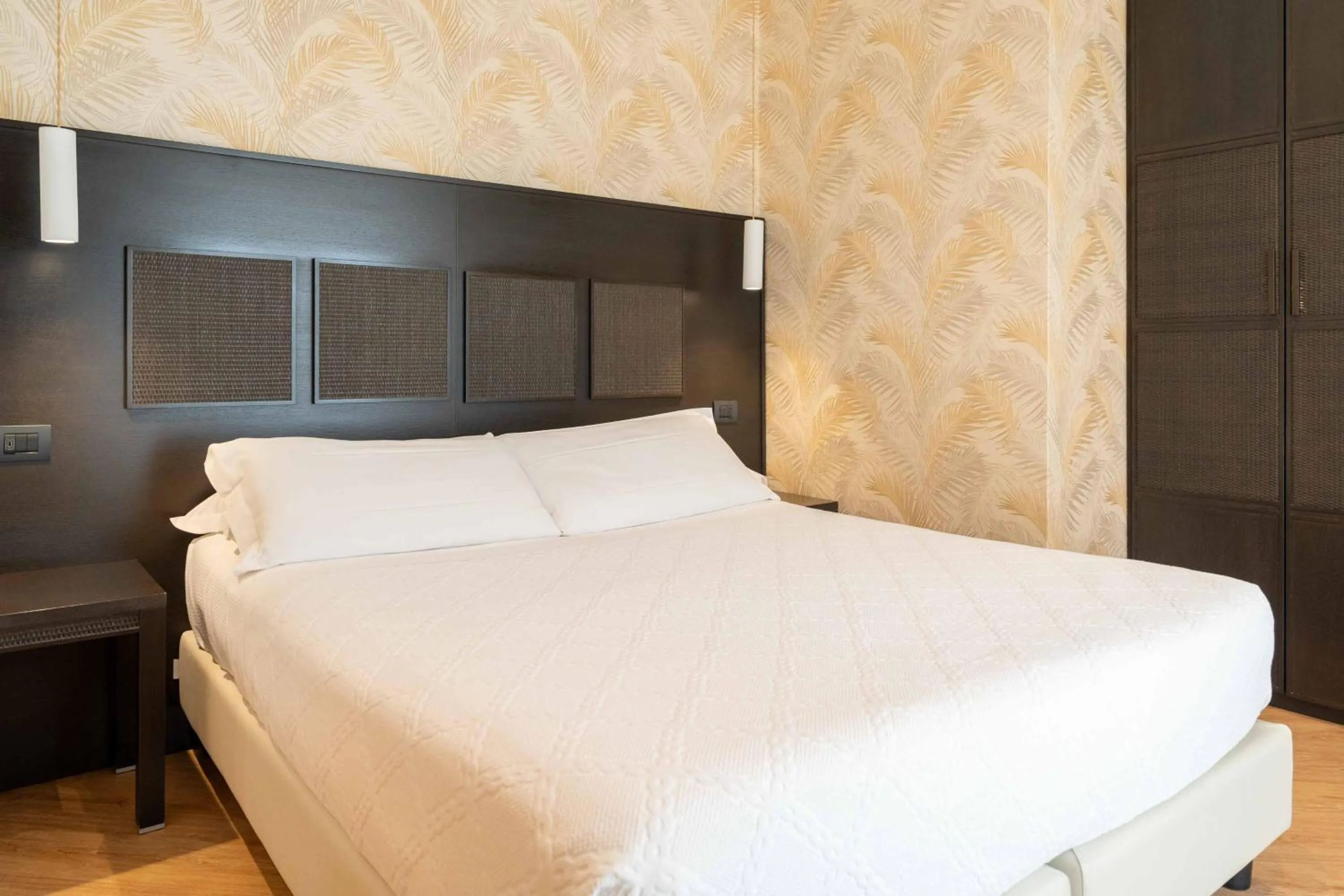 Bed in Hotel Florida Lerici