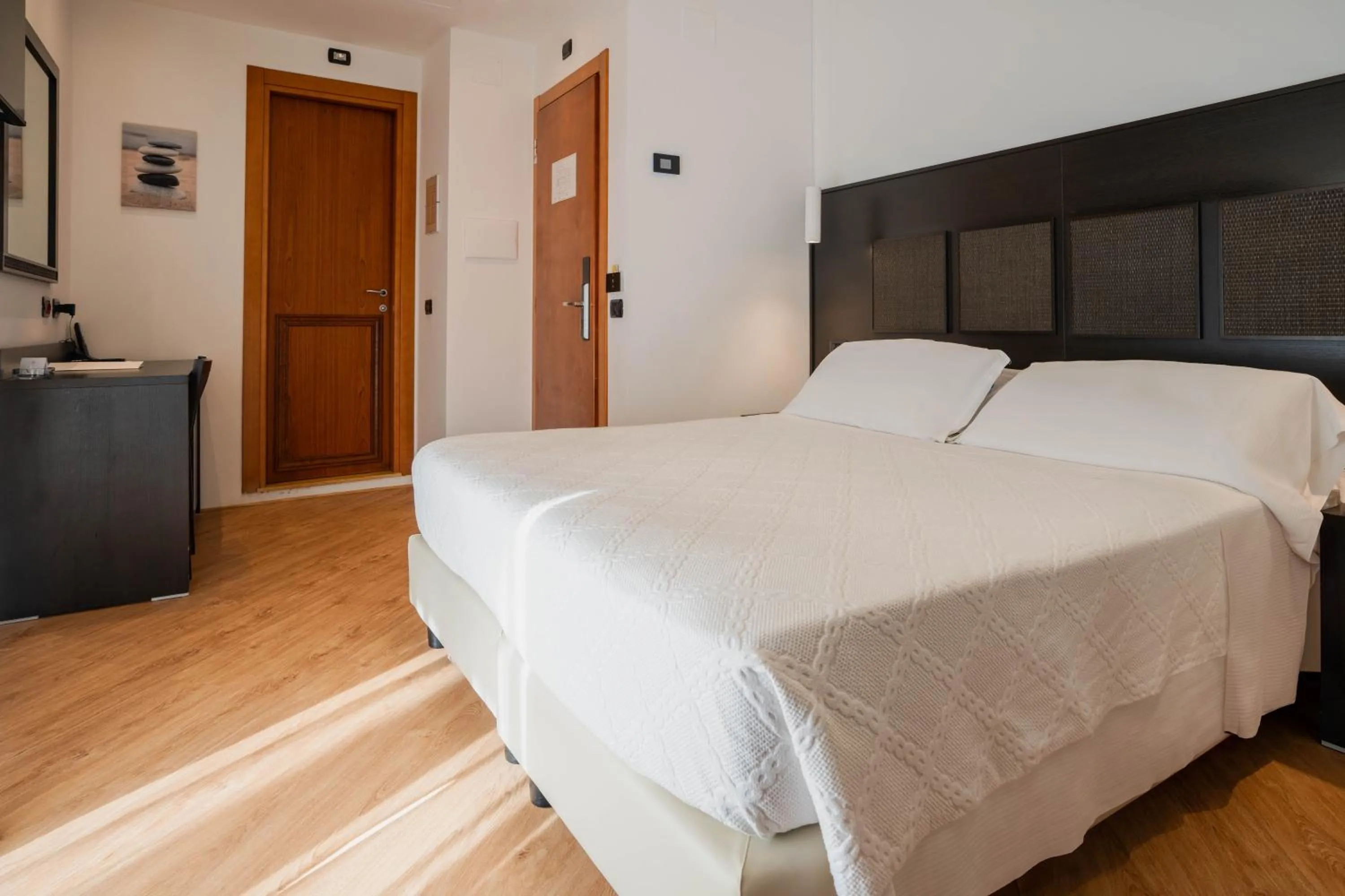 Bed in Hotel Florida Lerici