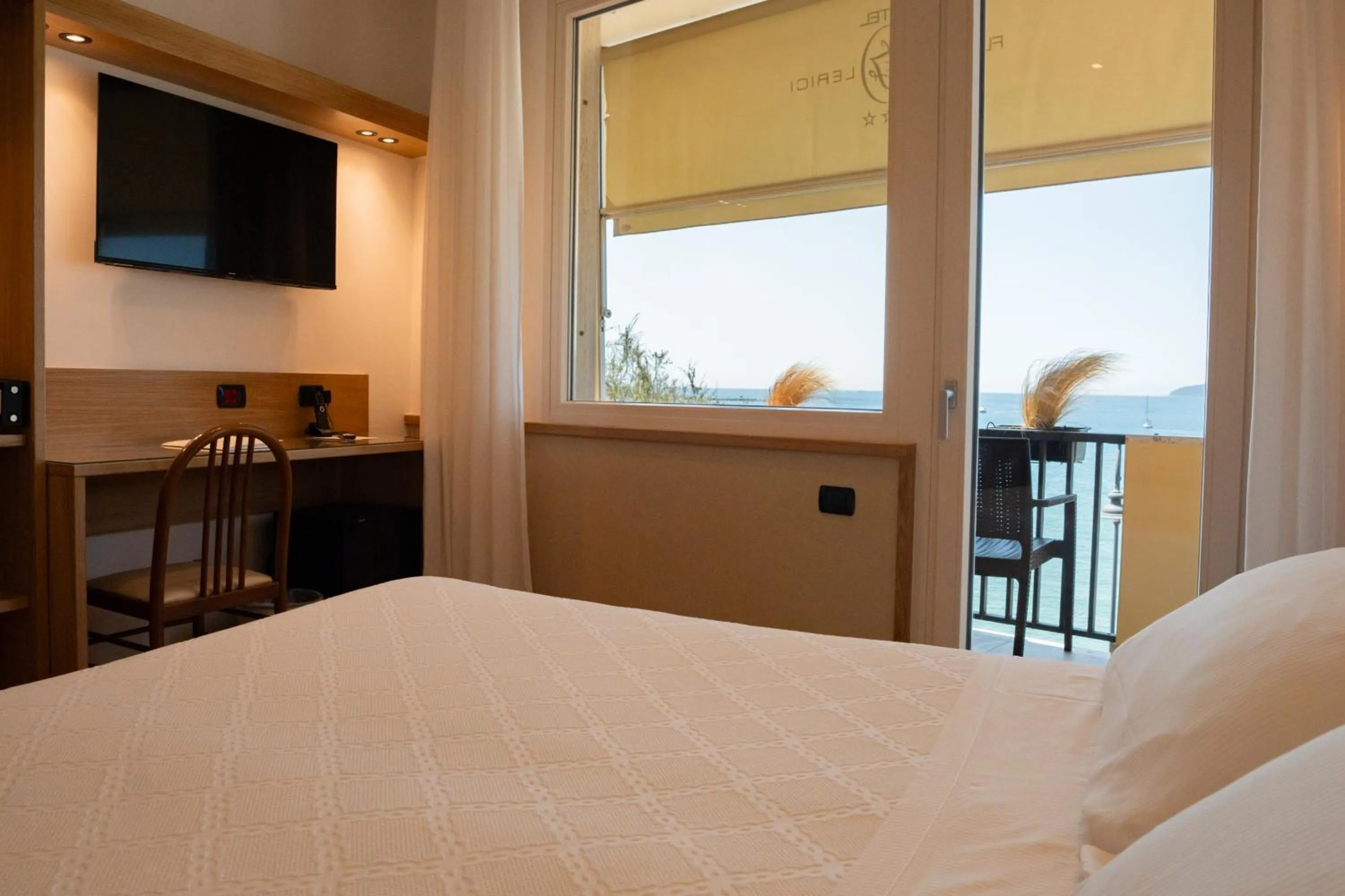 Bed in Hotel Florida Lerici