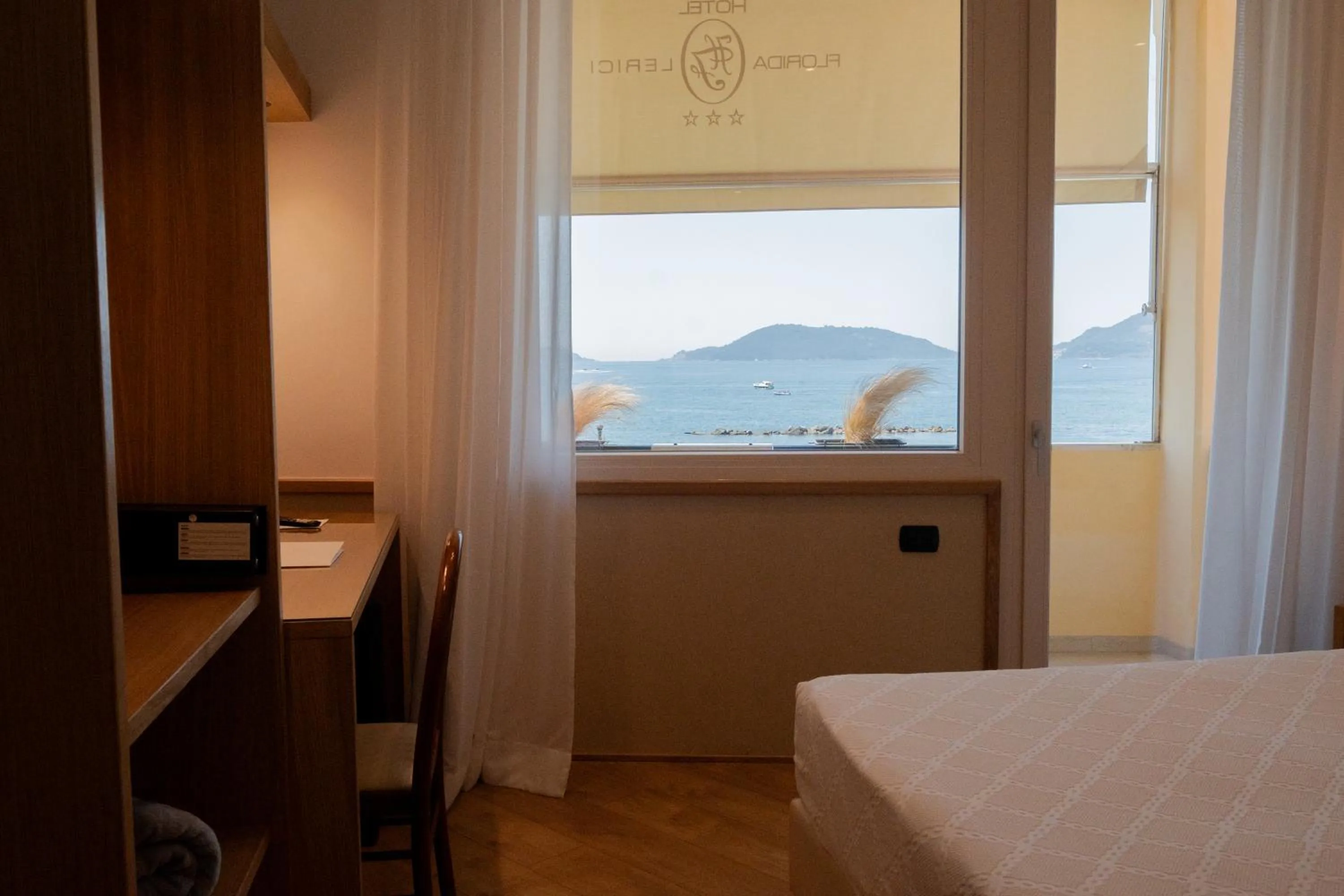 Bed in Hotel Florida Lerici