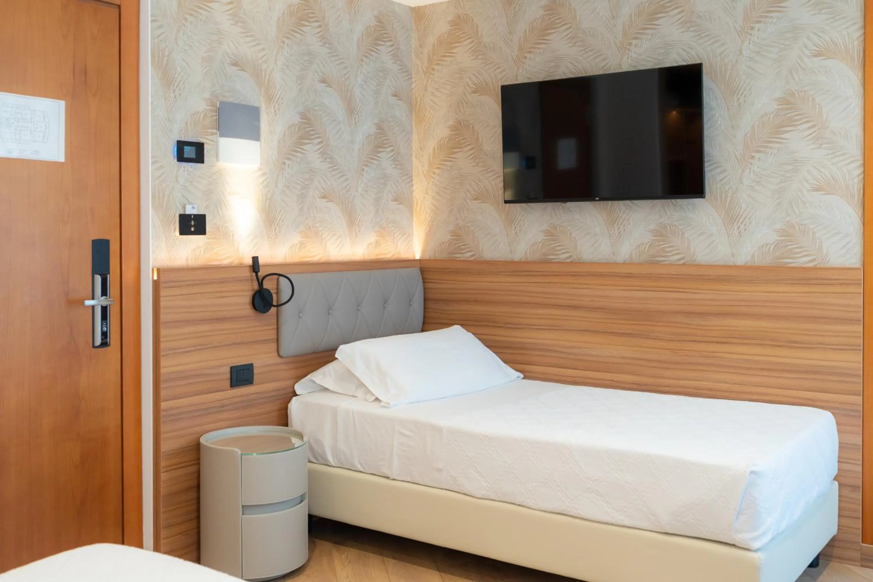 Bed in Hotel Florida Lerici