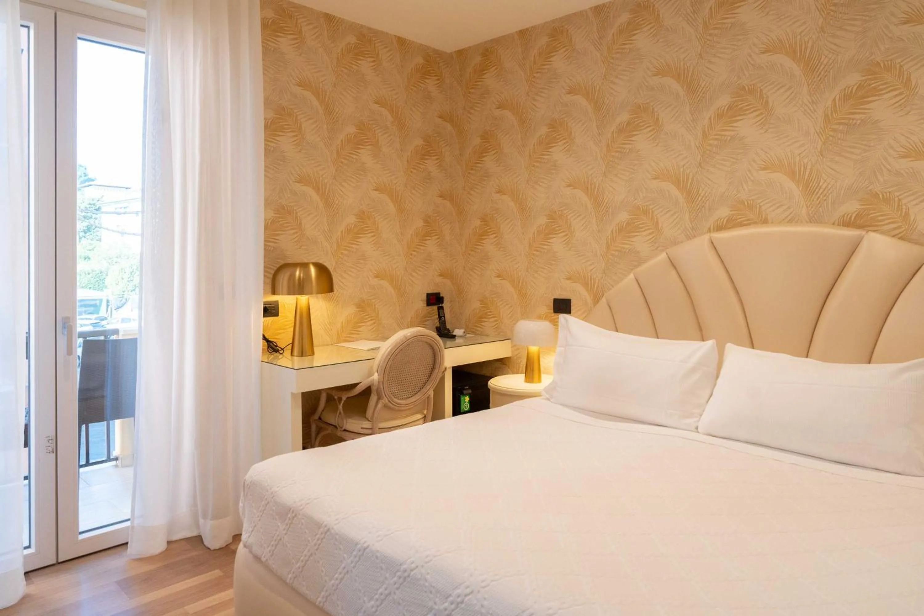 Bed in Hotel Florida Lerici