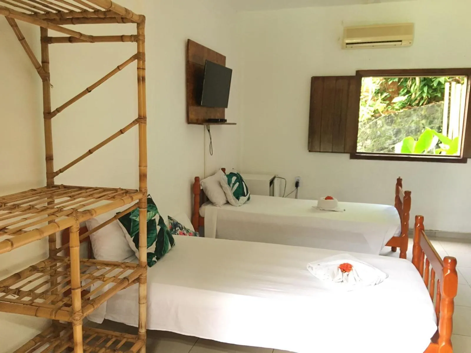 Bed in Pousada Bicho Preguiça