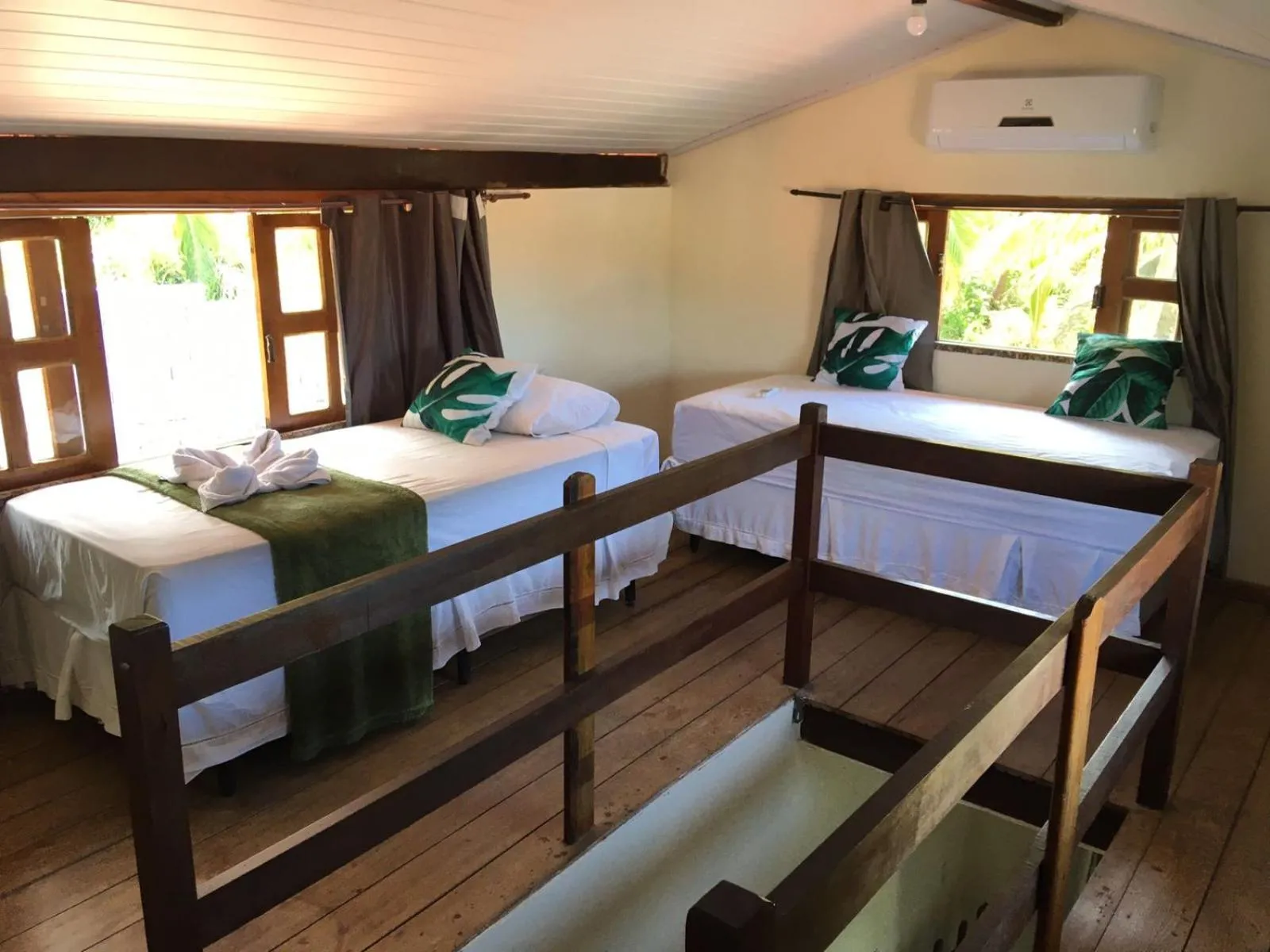 Bed in Pousada Bicho Preguiça