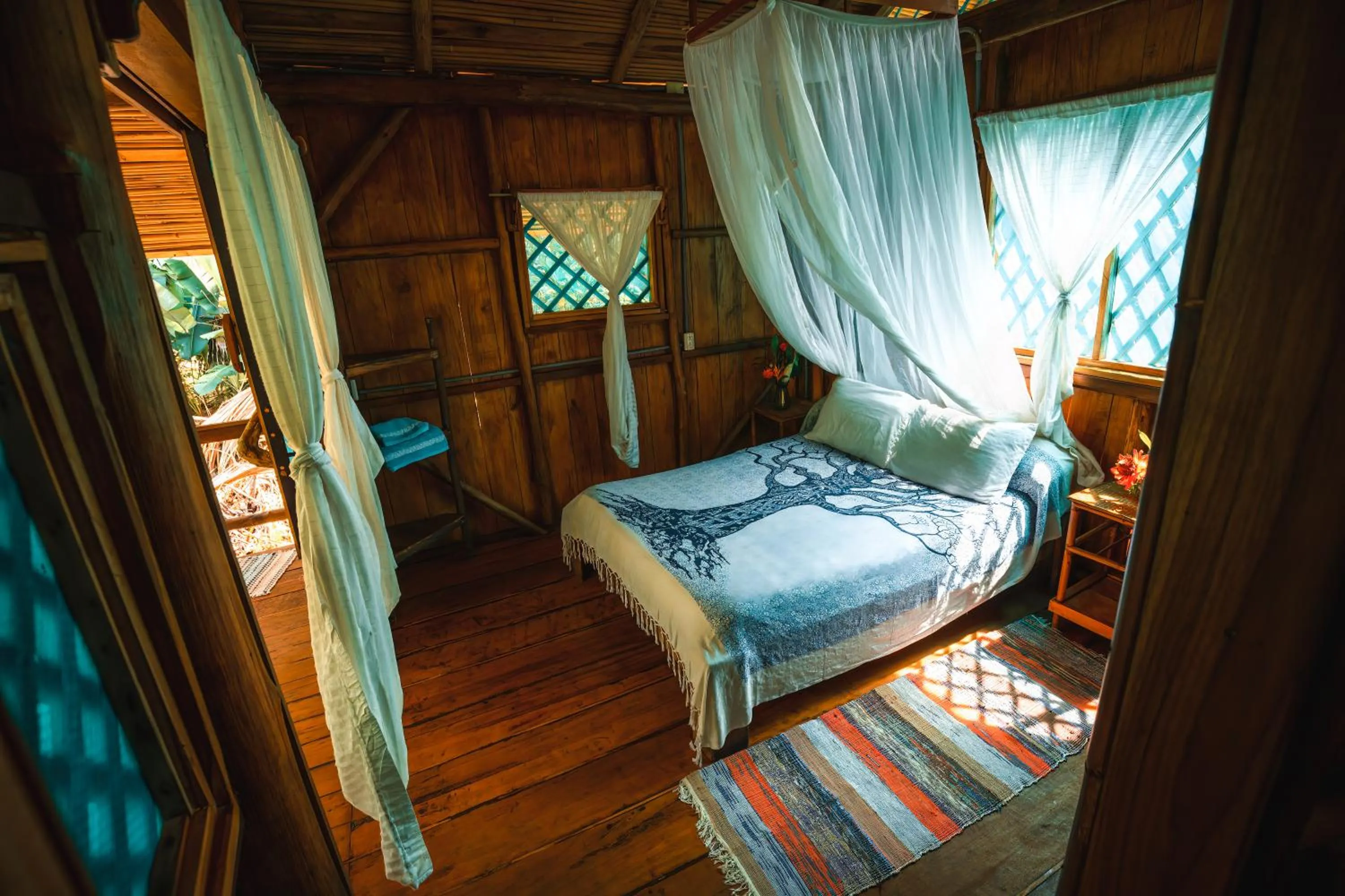 Bed in Ocean Forest Ecolodge