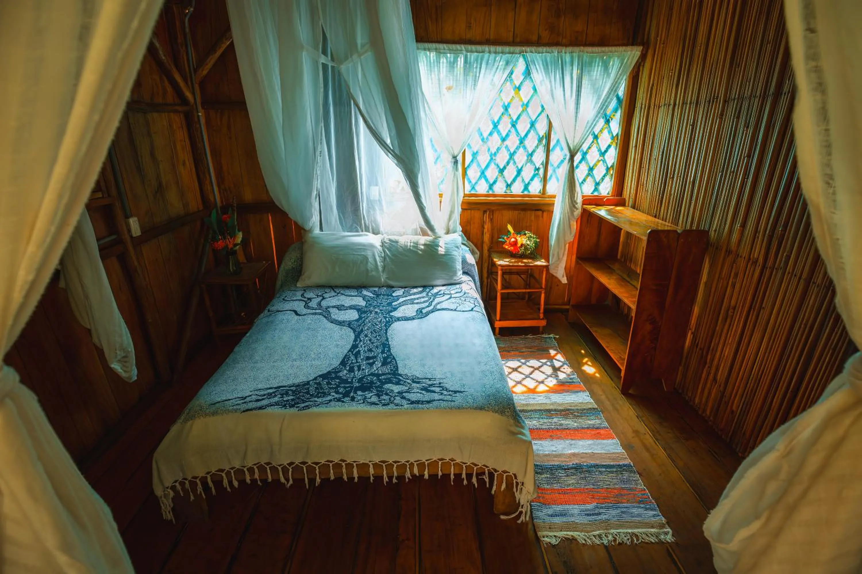 Bed in Ocean Forest Ecolodge