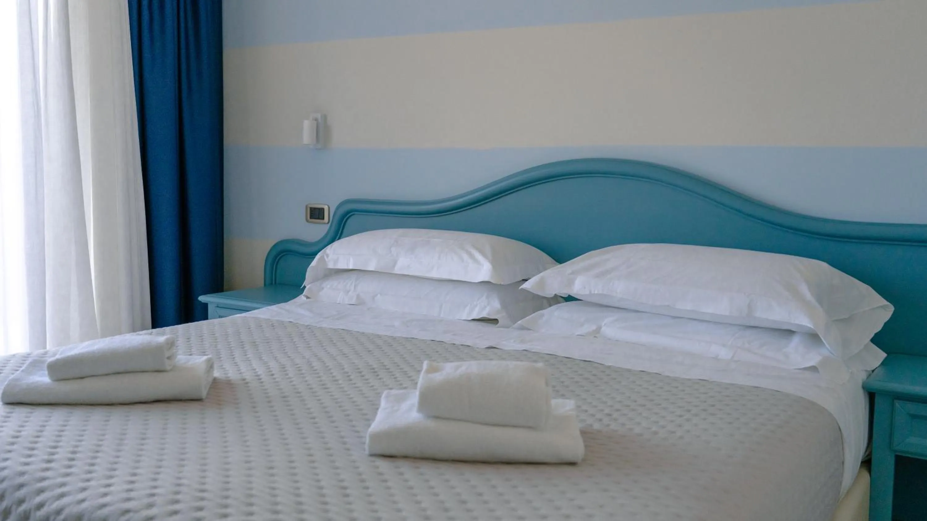 Bed in AHG Riva Del Sole Hotel - Adults Only