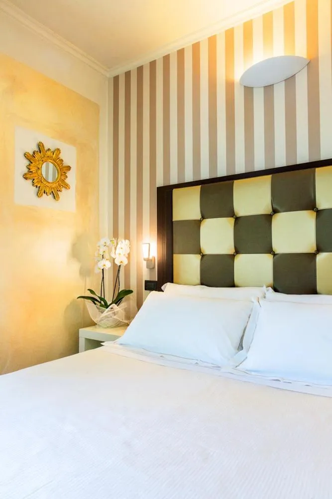 Bed in JR Resort Logos Forte dei Marmi