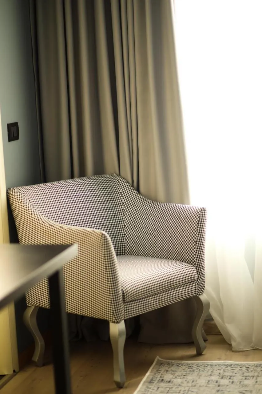 Bedroom in Triss Hotel