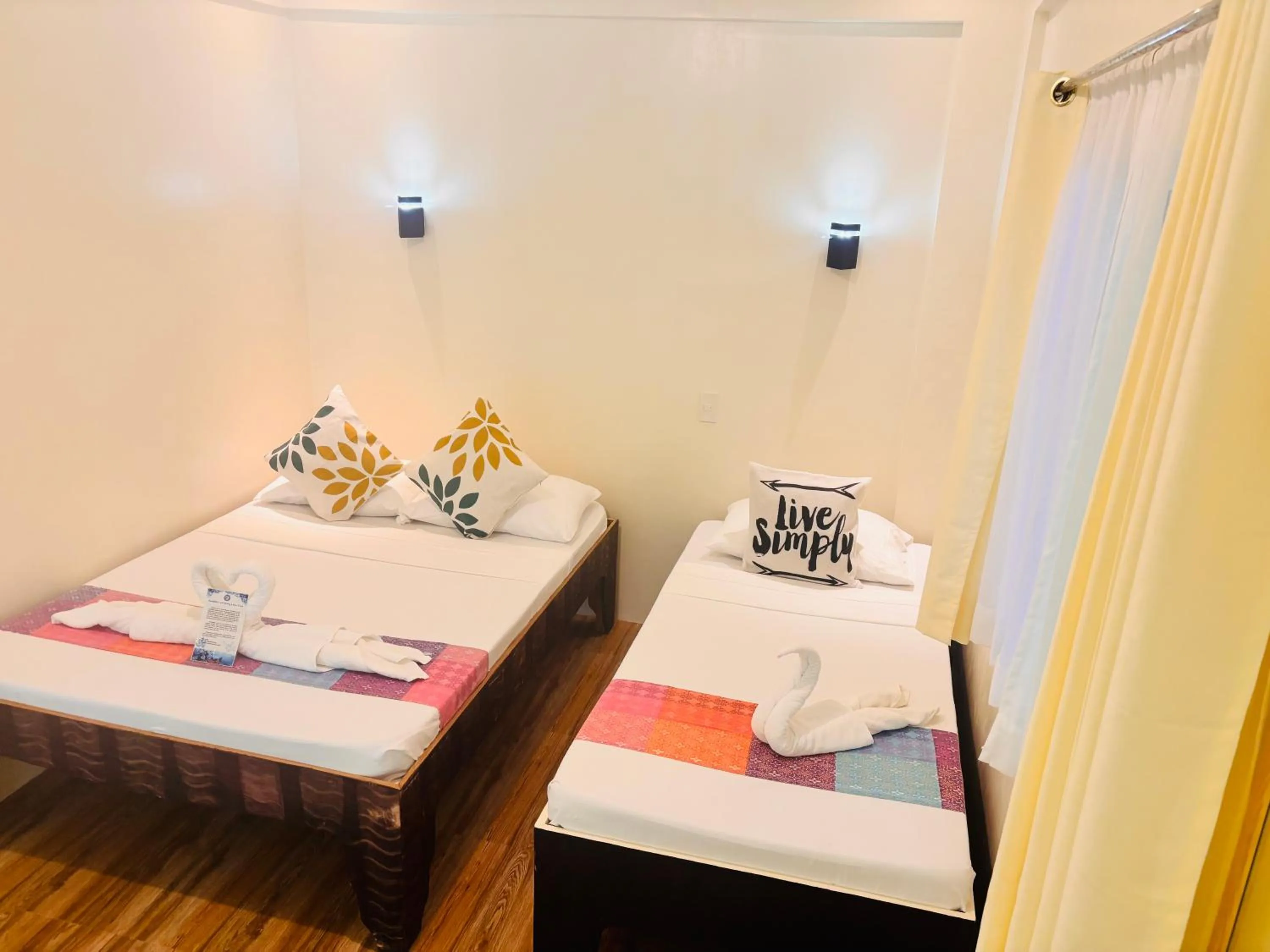 Bed in PamAnilao and Padoy's Dive Camp