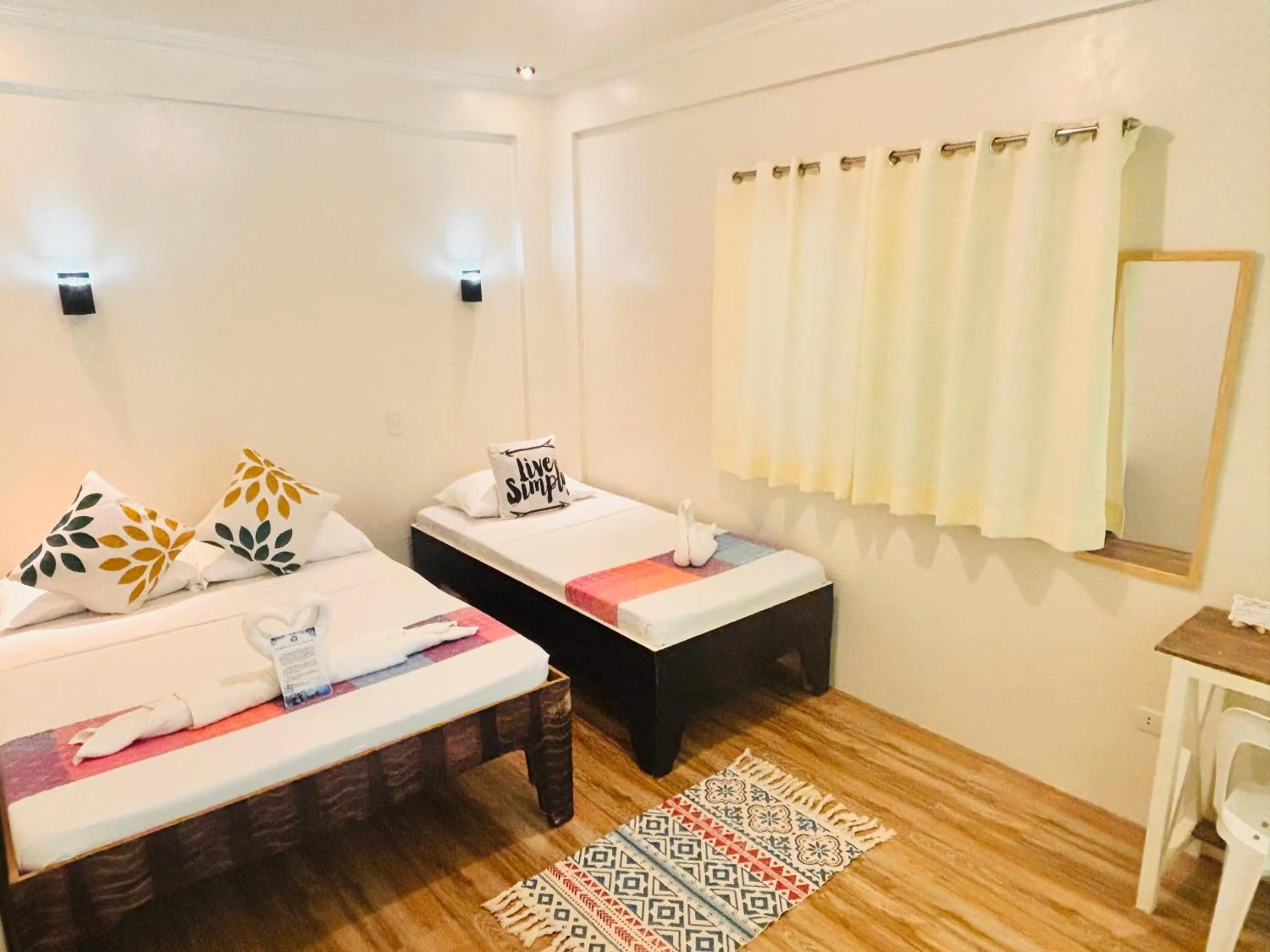 Bed in PamAnilao and Padoy's Dive Camp