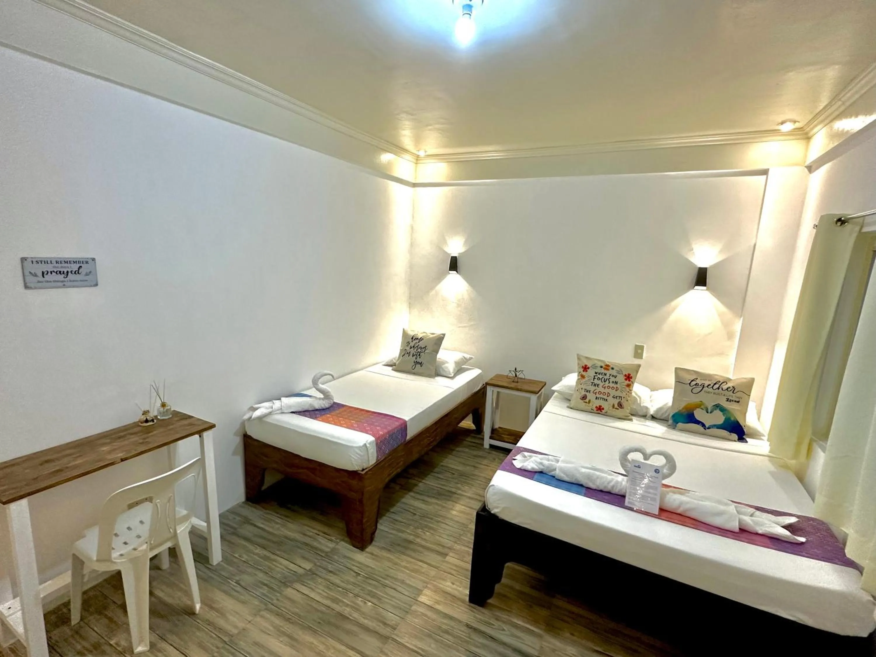 Bed in PamAnilao and Padoy's Dive Camp