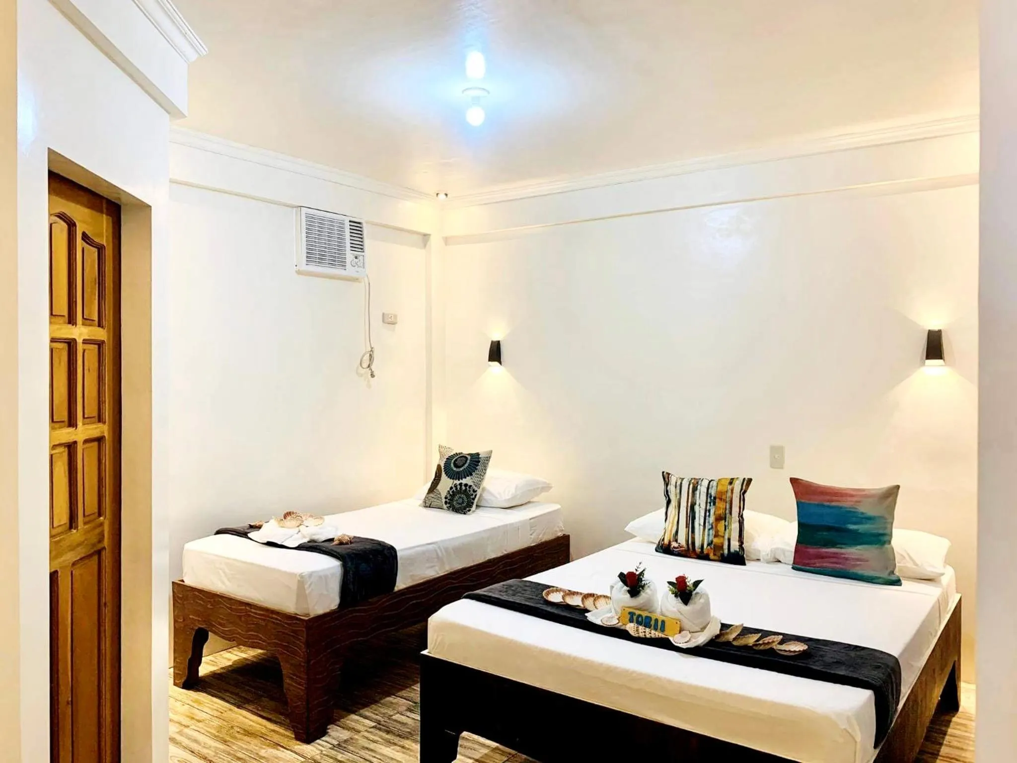 Bed in PamAnilao and Padoy's Dive Camp