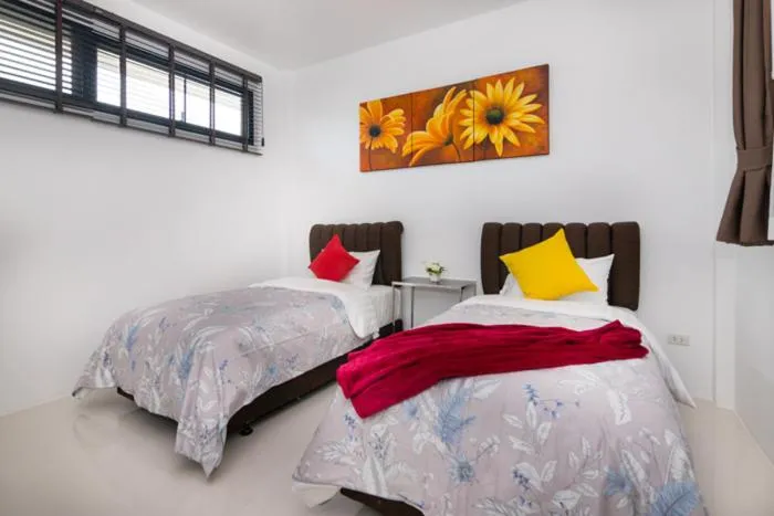 Bed in Baan Nern Khao Resort Pattaya