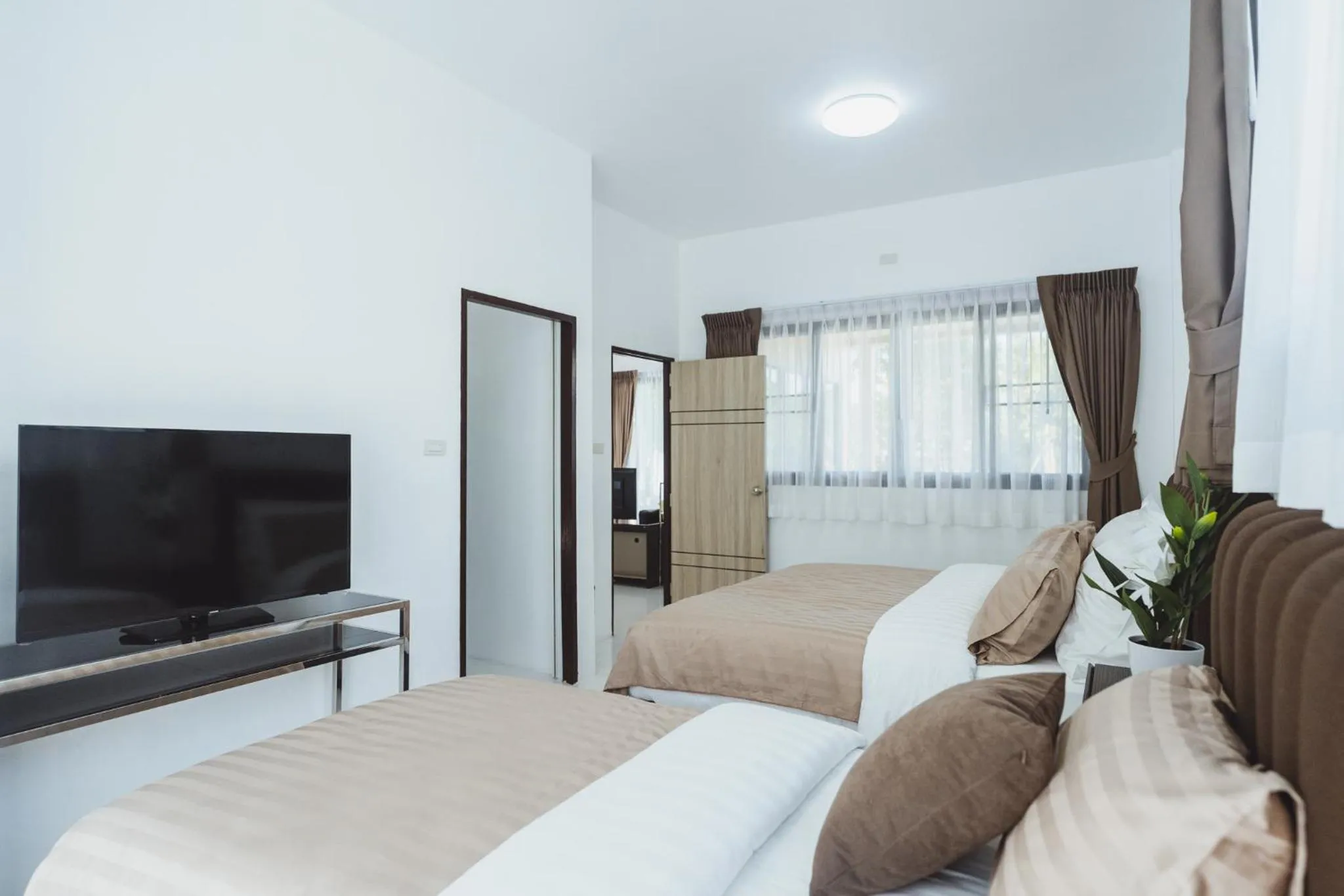 Bed in Baan Nern Khao Resort Pattaya