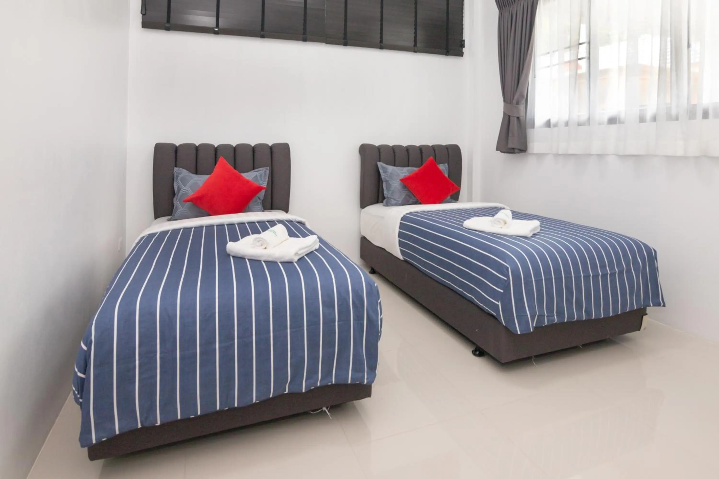 Bed in Baan Nern Khao Resort Pattaya