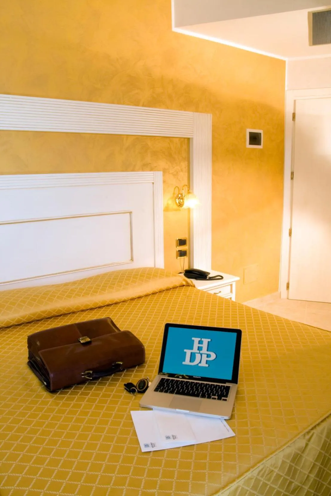 Bed in Hotel Diplomat Palace