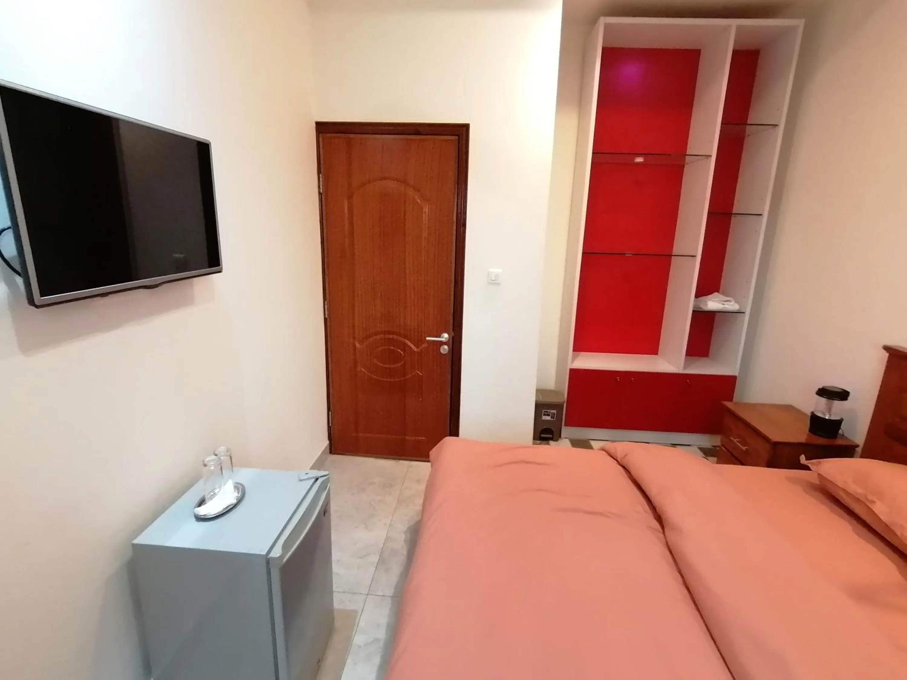 Bed in RÉSIDENCE HÔTELIÈRE KAWEROU