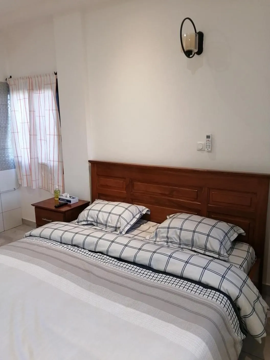 Bed in RÉSIDENCE HÔTELIÈRE KAWEROU