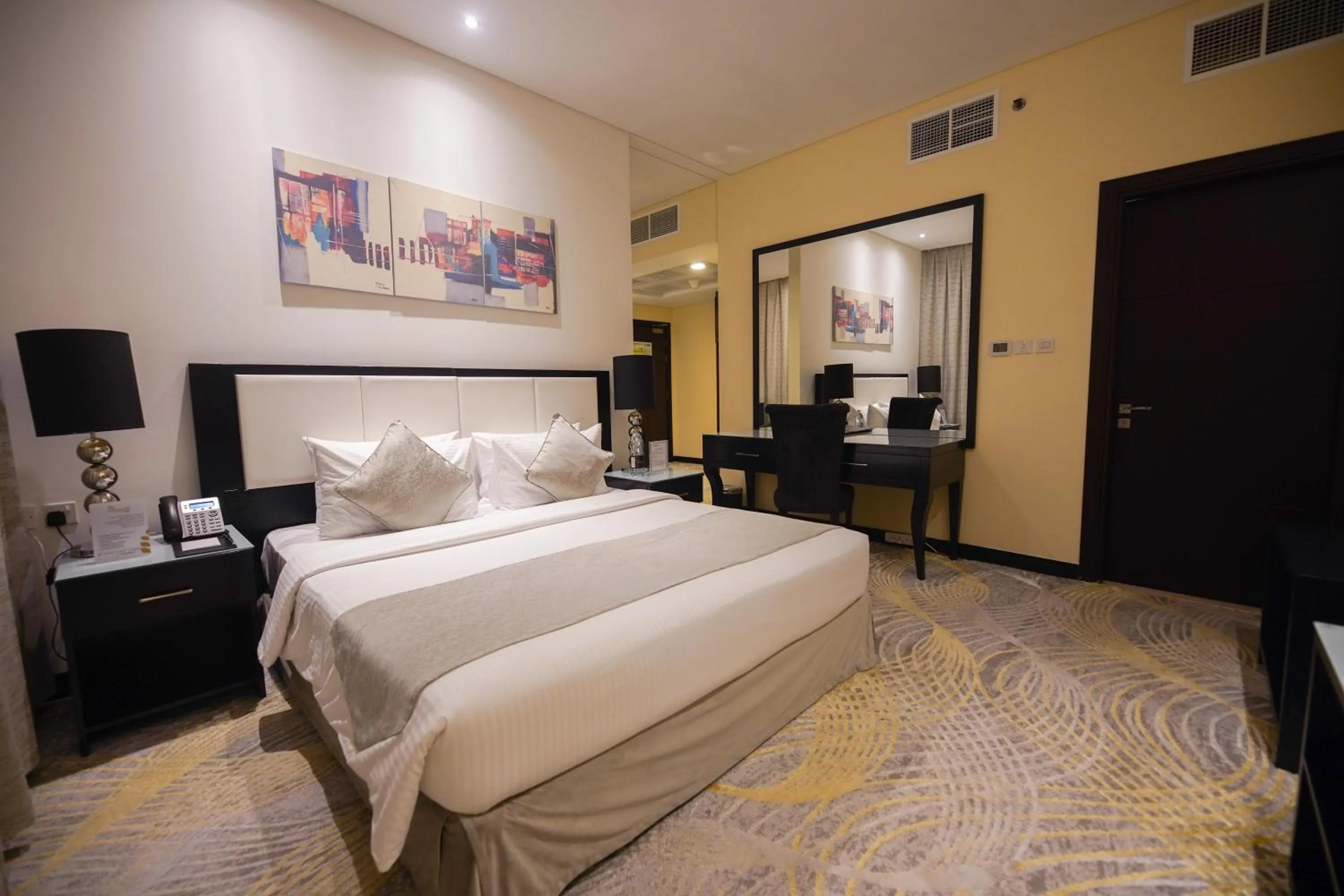 Bed in Grand Villaggio Hotel Abu Dhabi