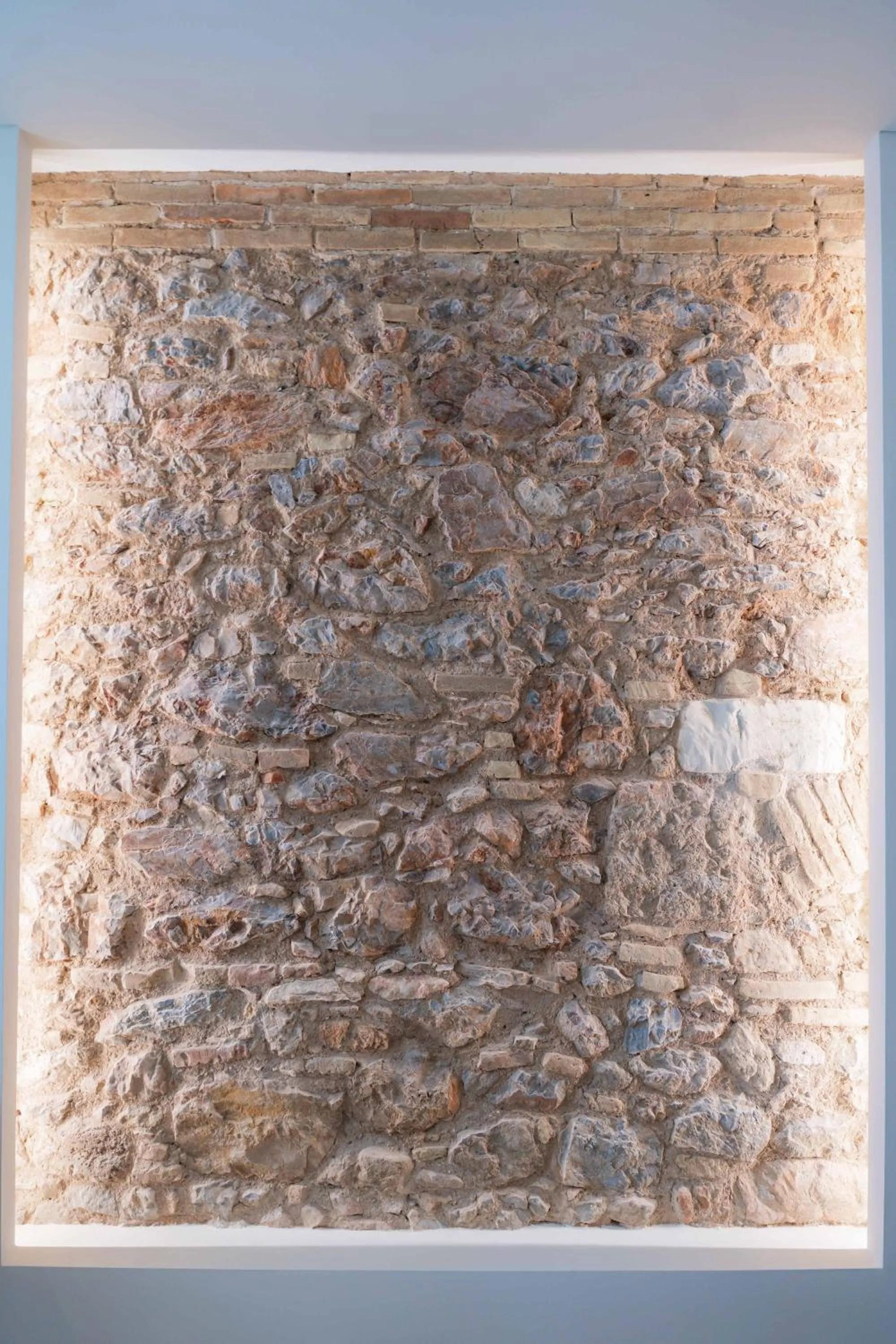 Bedroom in Paleo Suites