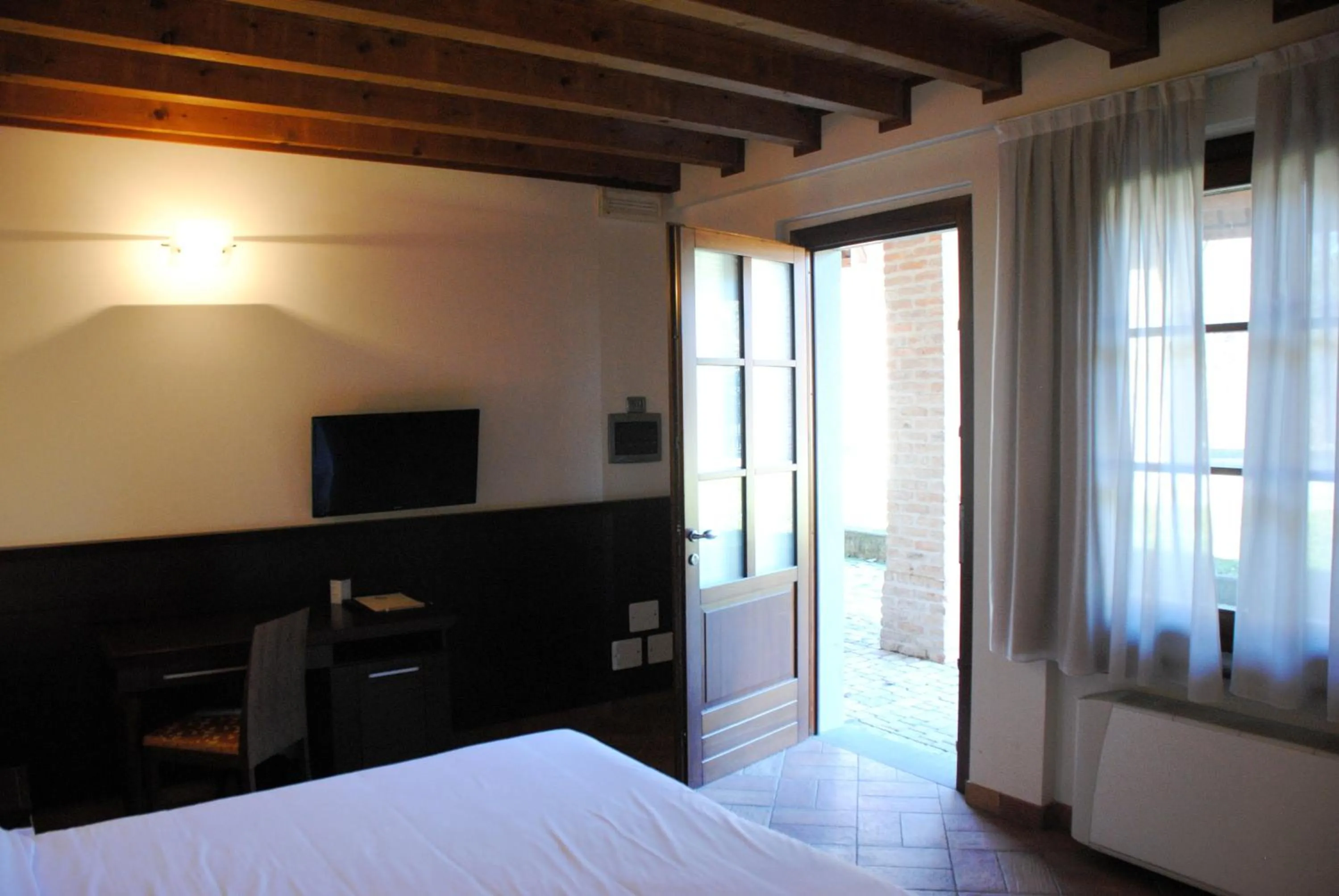 Photo of the whole room, Bed in Country Hotel Castelbarco