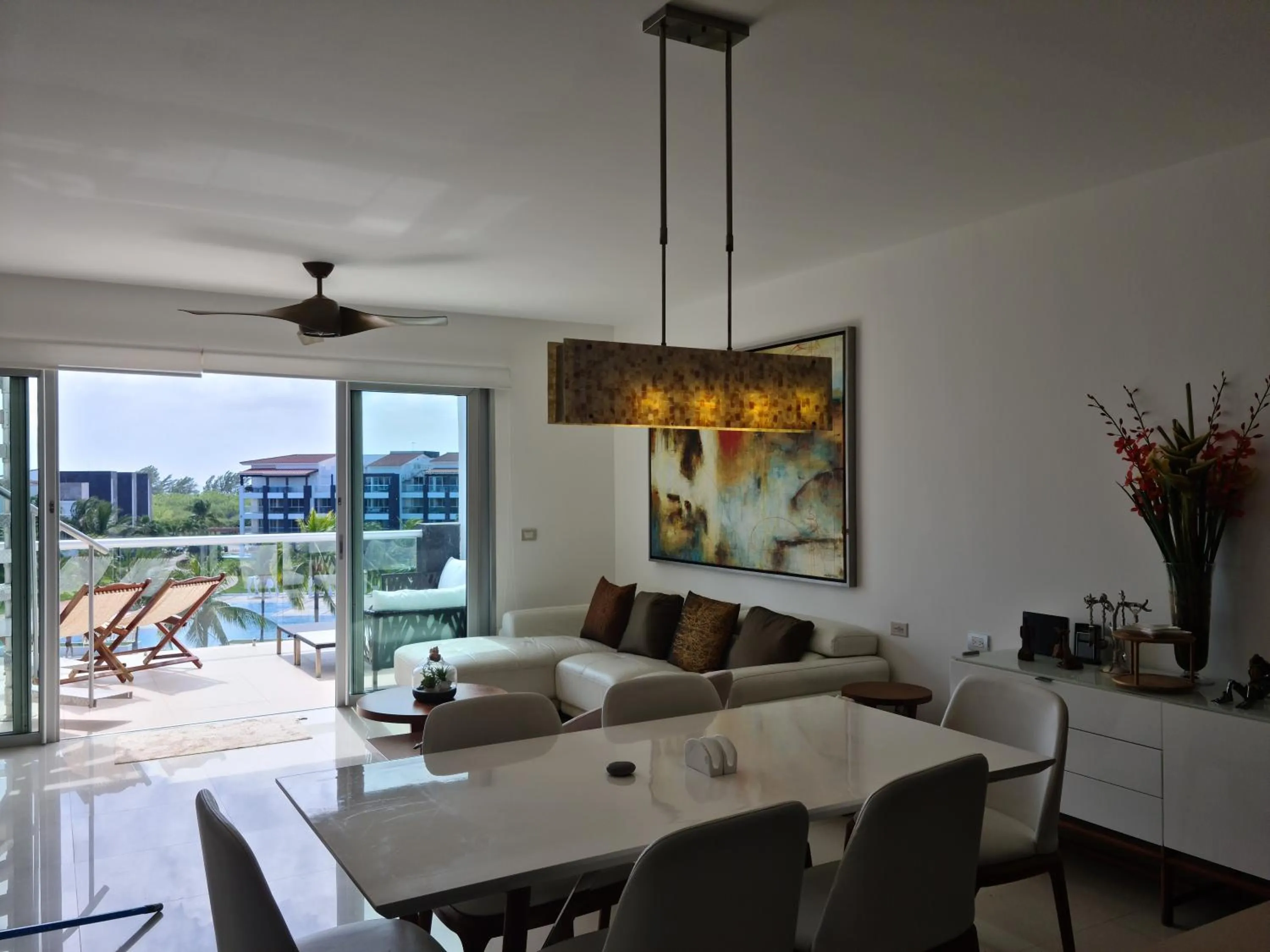 Living room in Luxury ocean view penthouse and private beach club