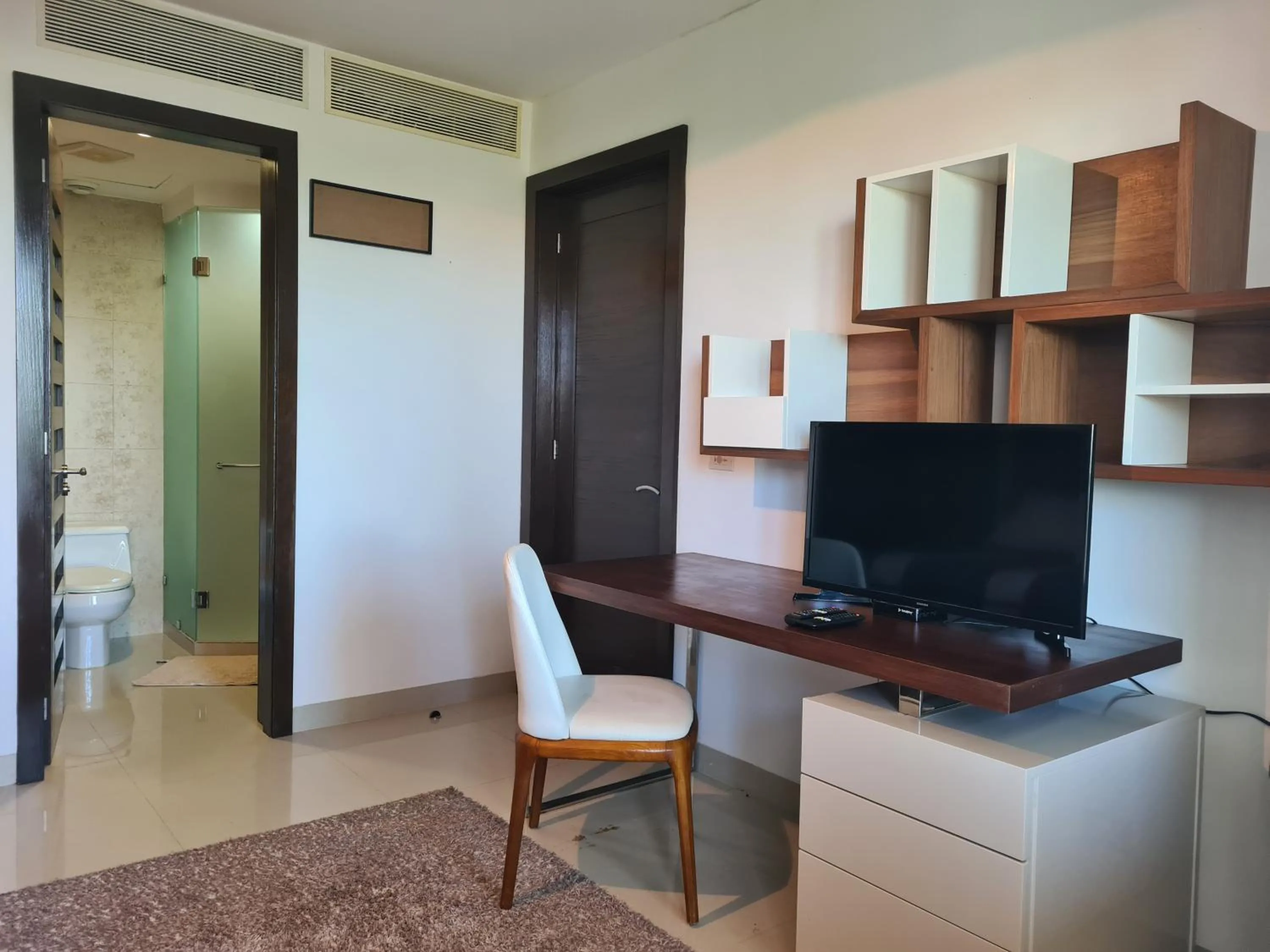 TV and multimedia in Luxury ocean view penthouse and private beach club