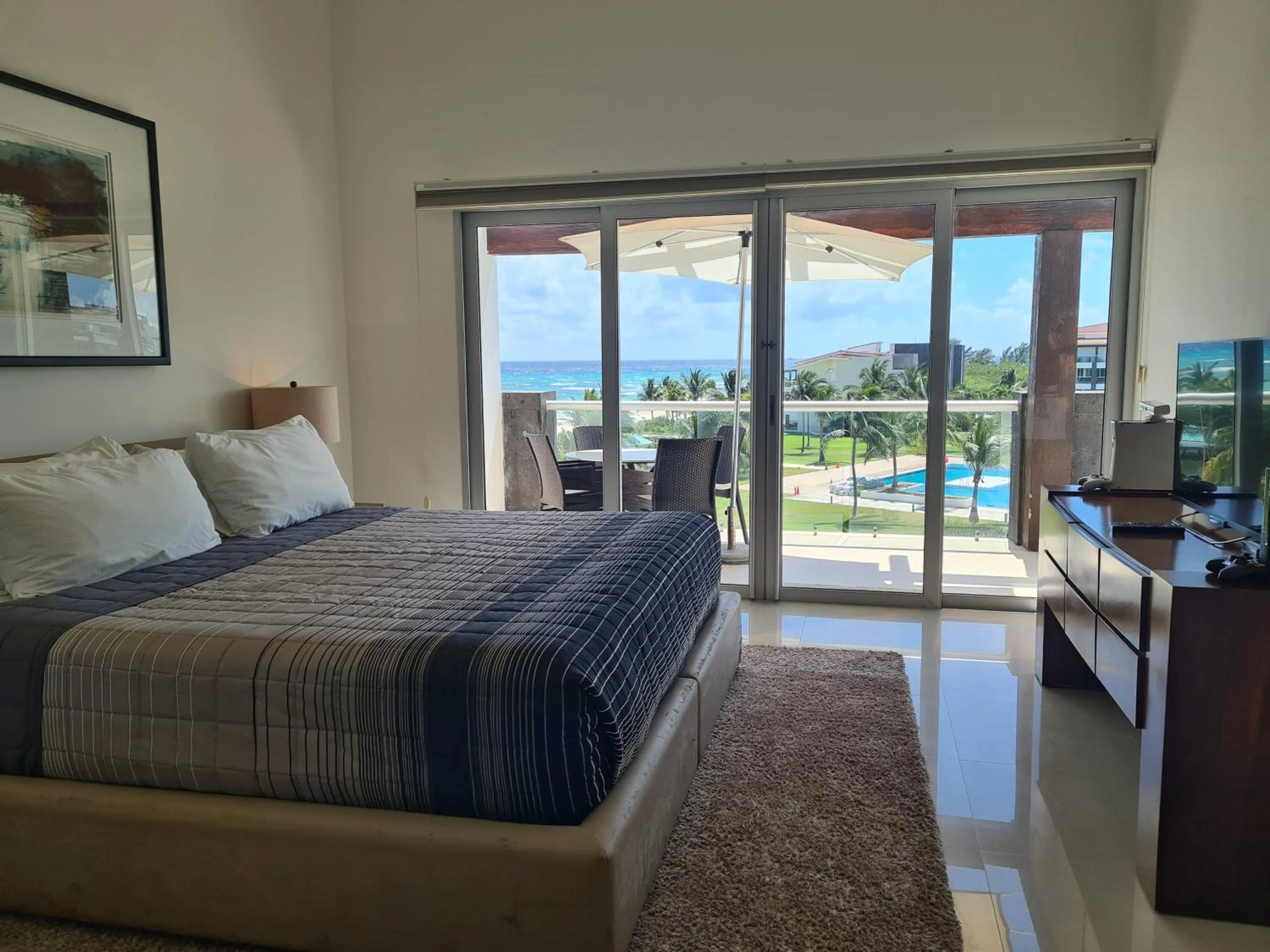 Photo of the whole room in Luxury ocean view penthouse and private beach club