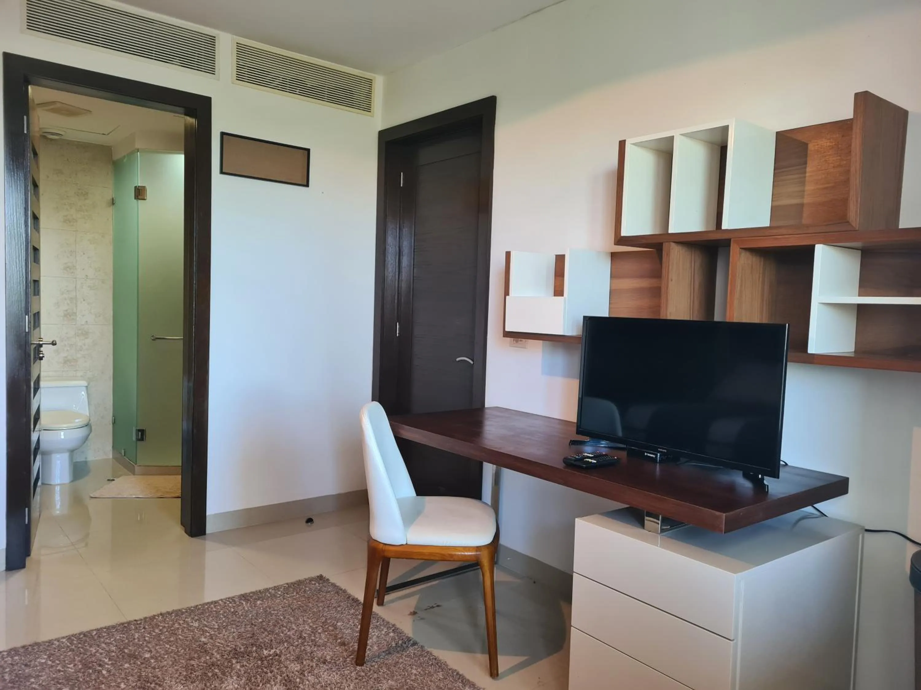 TV and multimedia in Luxury ocean view penthouse and private beach club