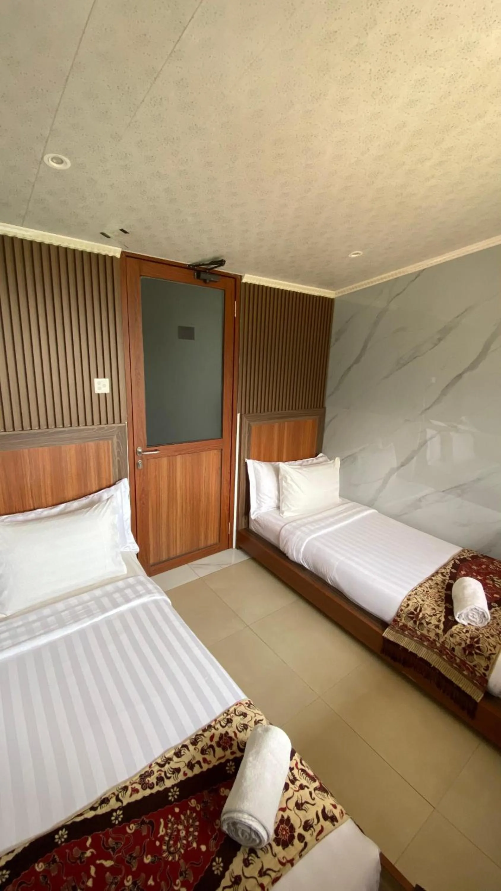 Bed in De Pointé Resort & Resto