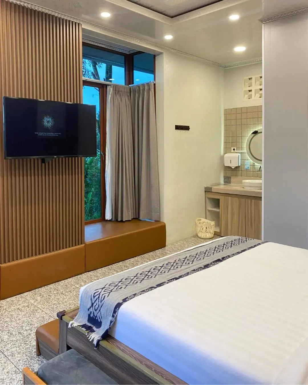 Bed in De Pointé Resort & Resto Bed in De Pointé Resort & Resto