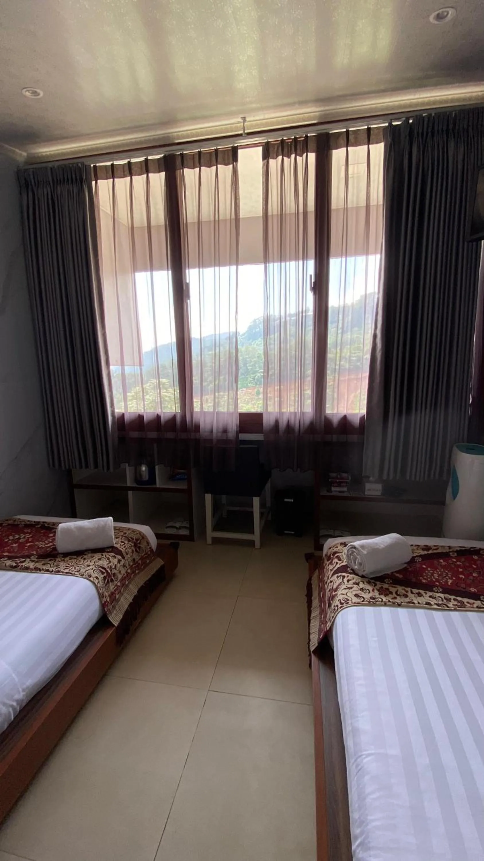 Bed in De Pointé Resort & Resto