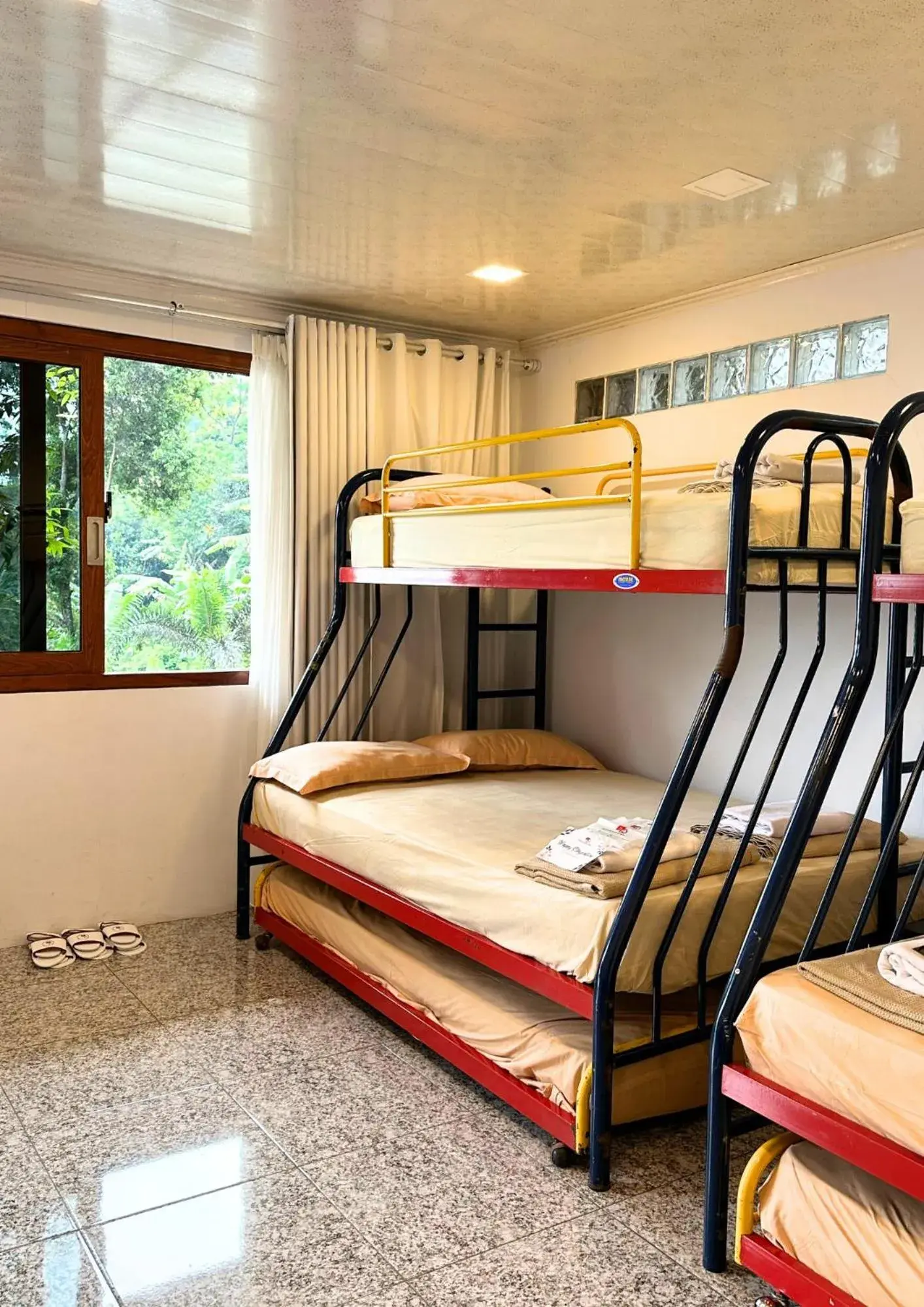 Bed in De Pointé Resort & Resto Bed in De Pointé Resort & Resto