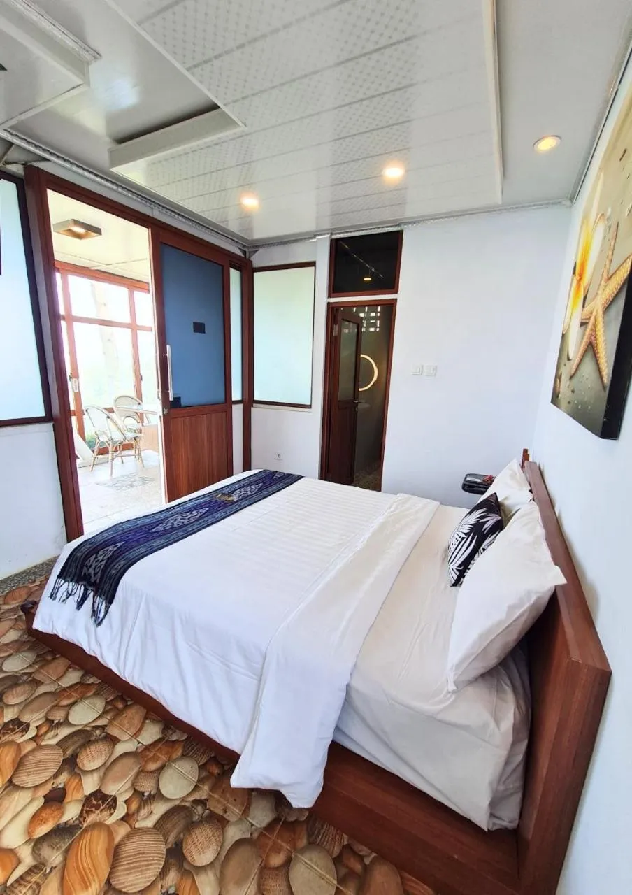 Bed in De Pointé Resort & Resto