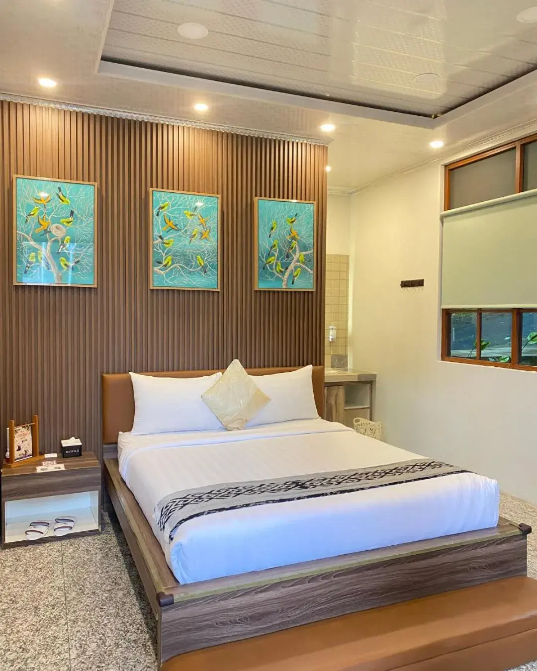 Bed in De Pointé Resort & Resto Bed in De Pointé Resort & Resto