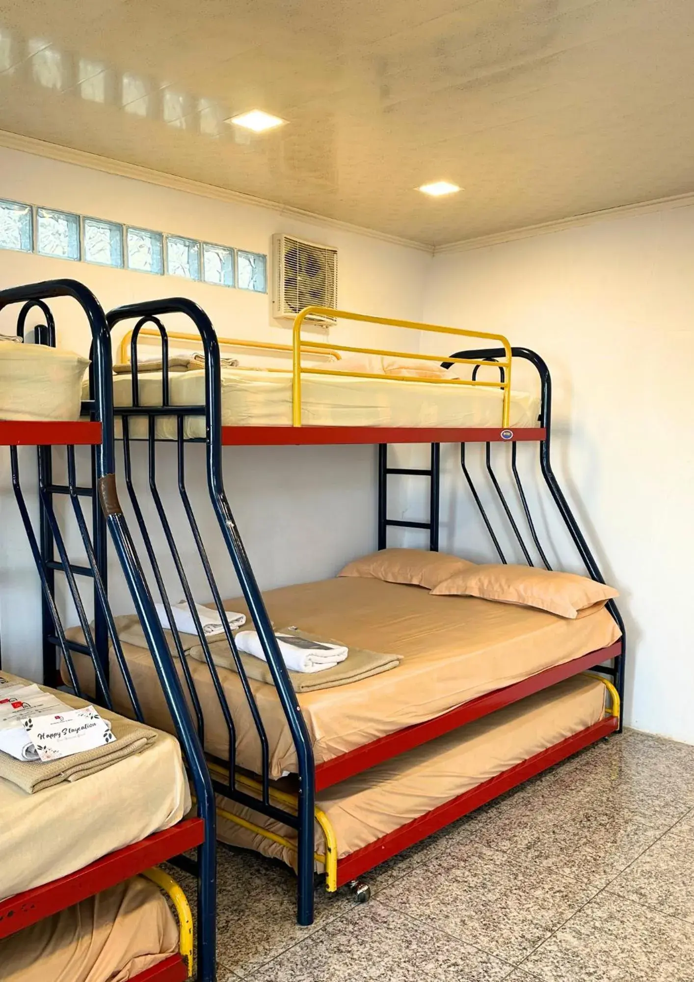 Bed in De Pointé Resort & Resto Bed in De Pointé Resort & Resto