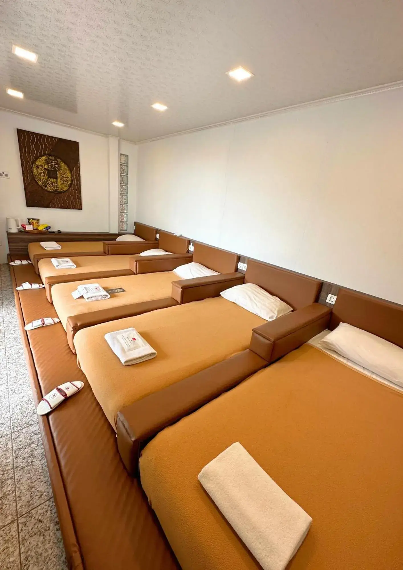 Bed in De Pointé Resort & Resto Bed in De Pointé Resort & Resto