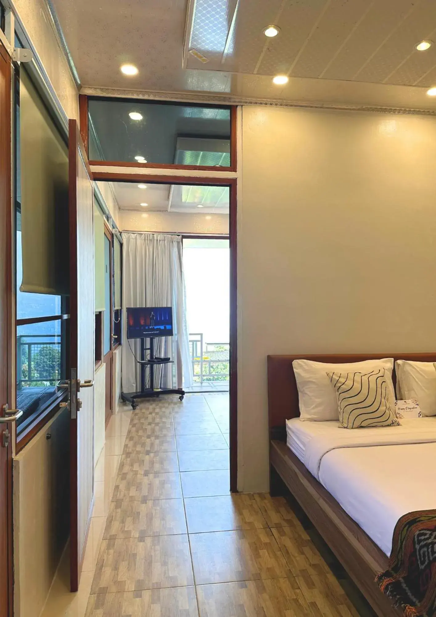 Bed in De Pointé Resort & Resto Bed in De Pointé Resort & Resto