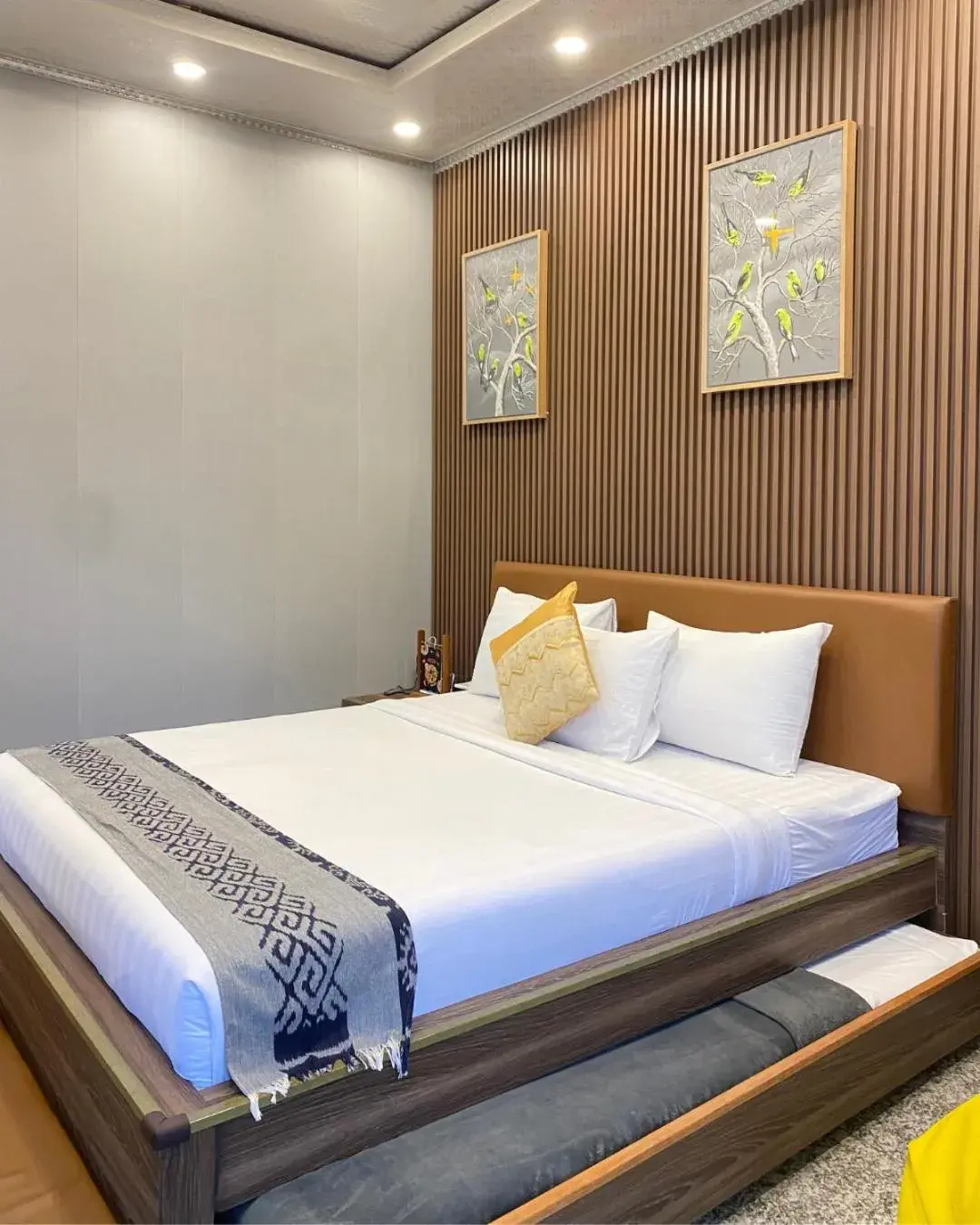 Bed in De Pointé Resort & Resto Bed in De Pointé Resort & Resto