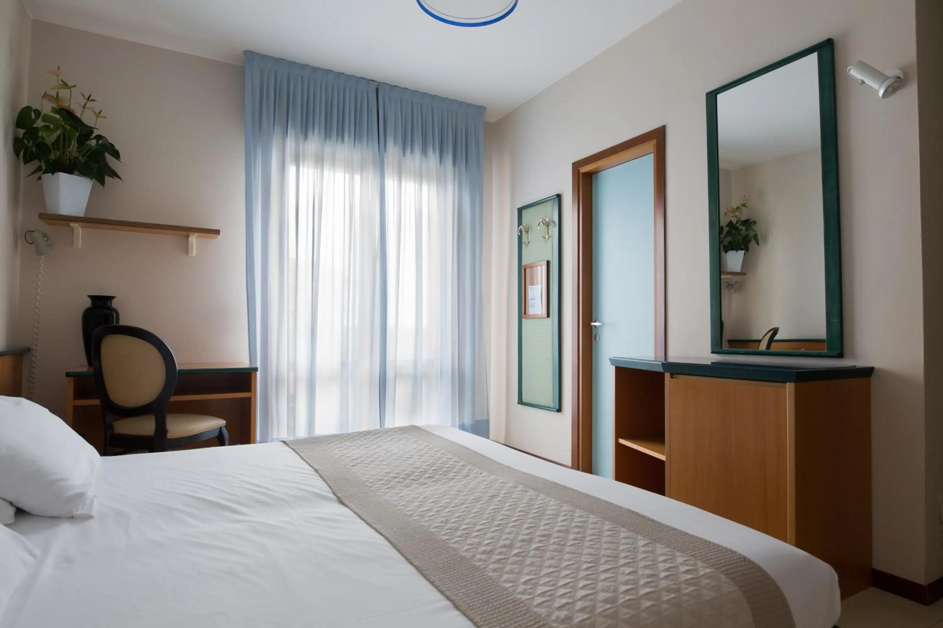 Photo of the whole room, Bed in Hotel Monaco & Quisisana